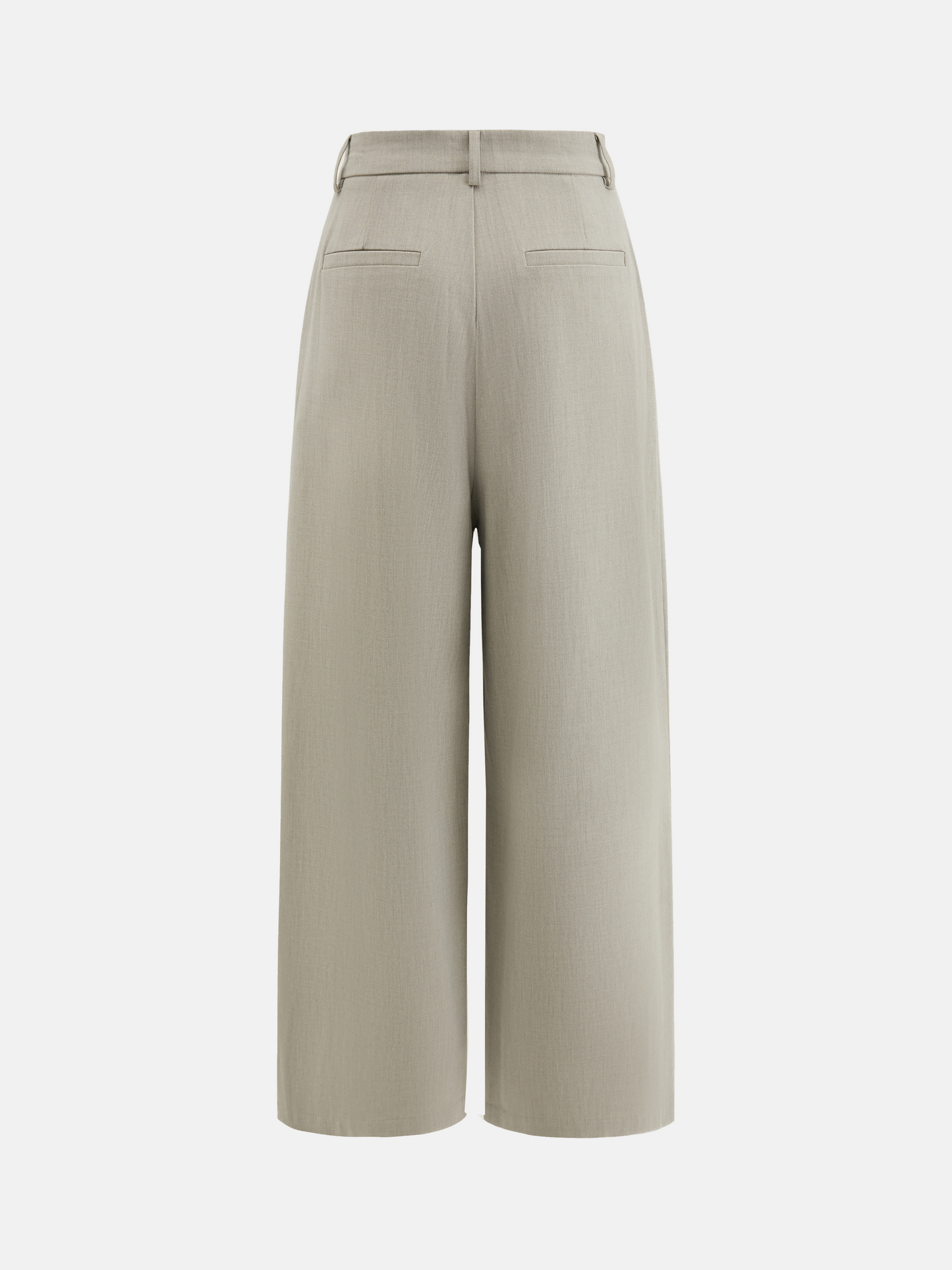 Cropped wide-leg trousers in quiet khaki, featuring deep pleats and an asymmetric front, embodying architectural form and fluid motion.