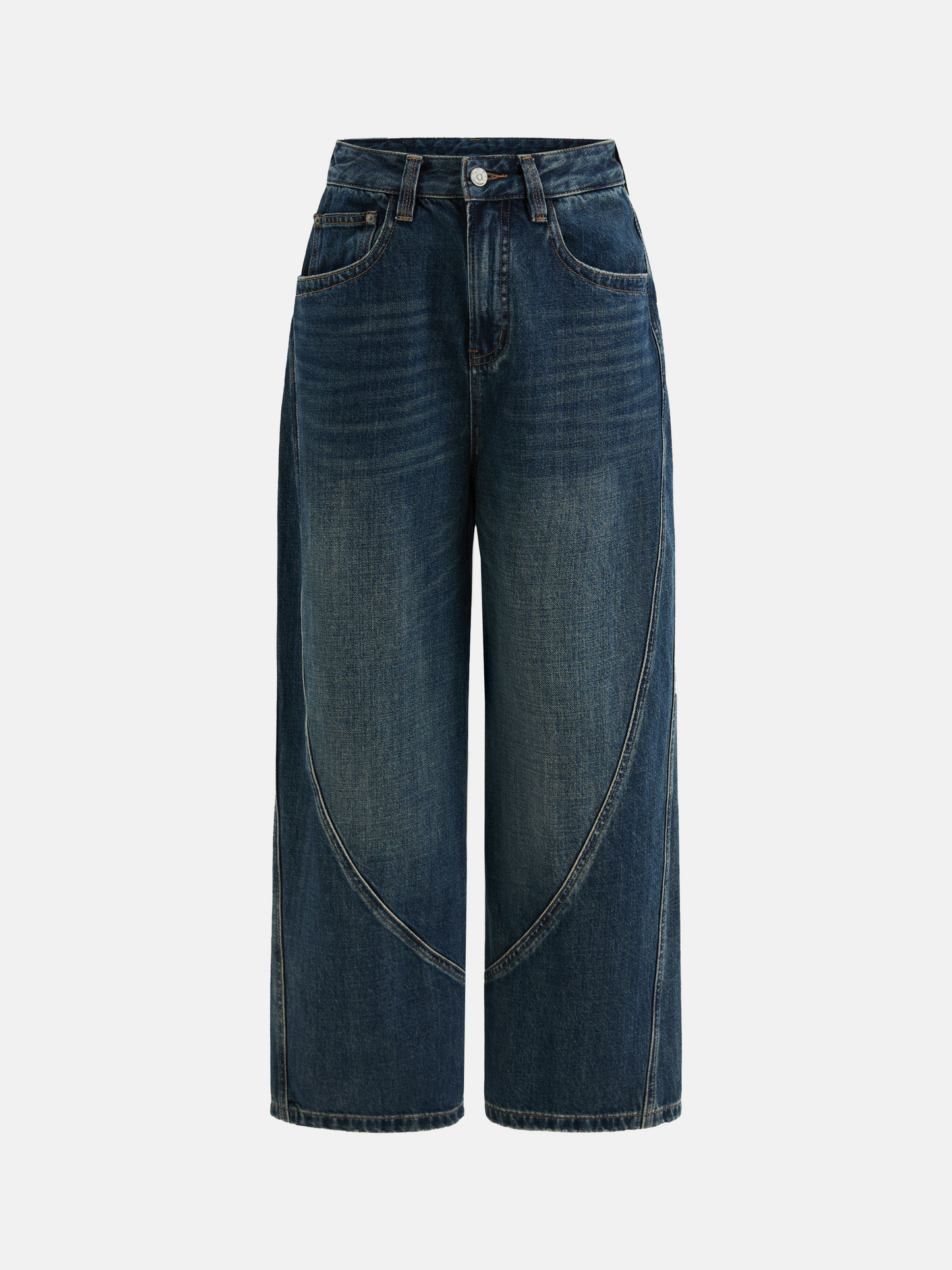 Model wearing high-rise SELVANE Sculpted Seam Wide-Leg Jeans in mid-wash pure cotton denim, showcasing the curved front seams.