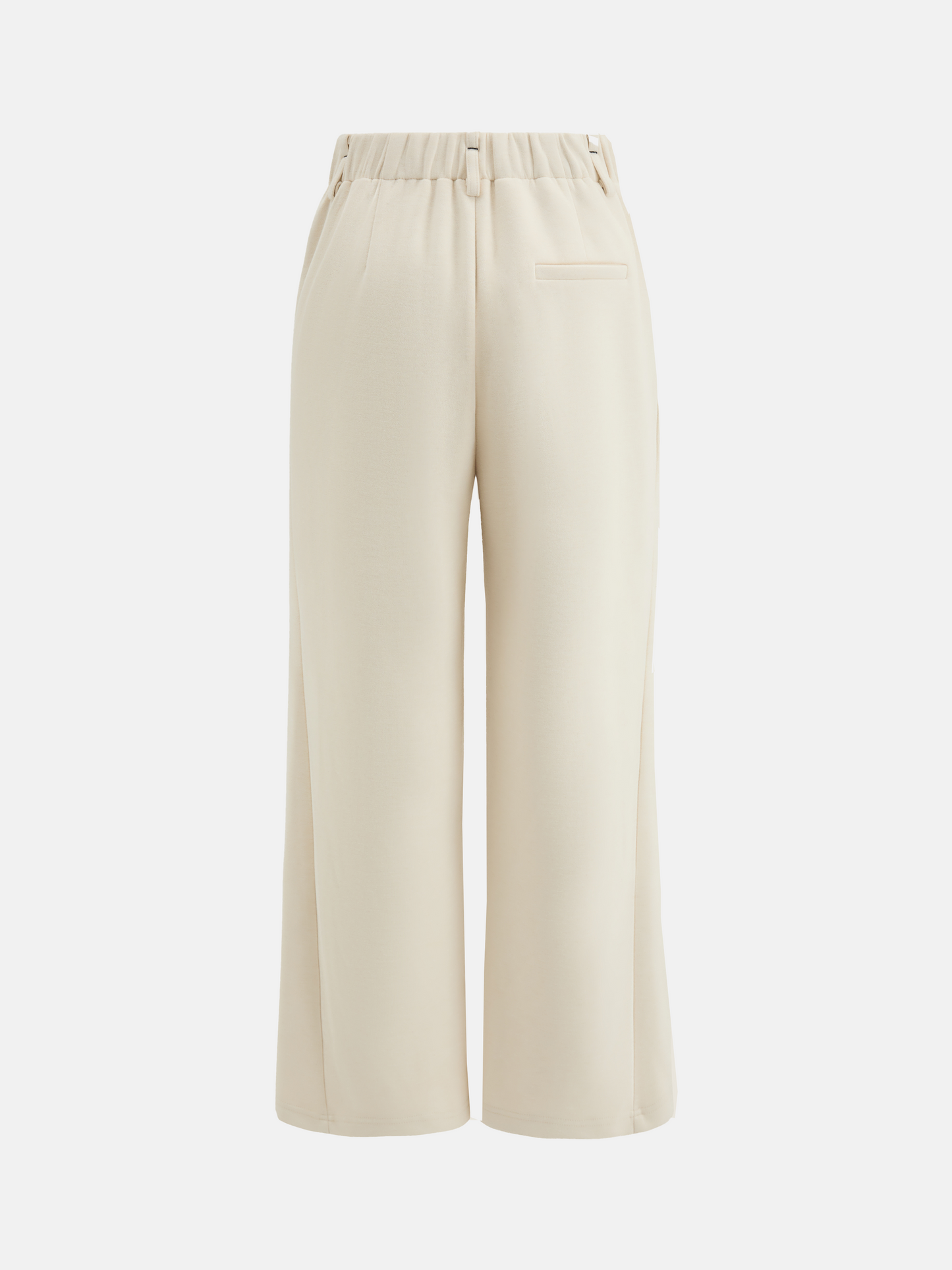 SELVANE Crease-Front Wide-Leg Trousers in a deep hue, showcasing crisp front creases and controlled volume, worn by a model in motion.