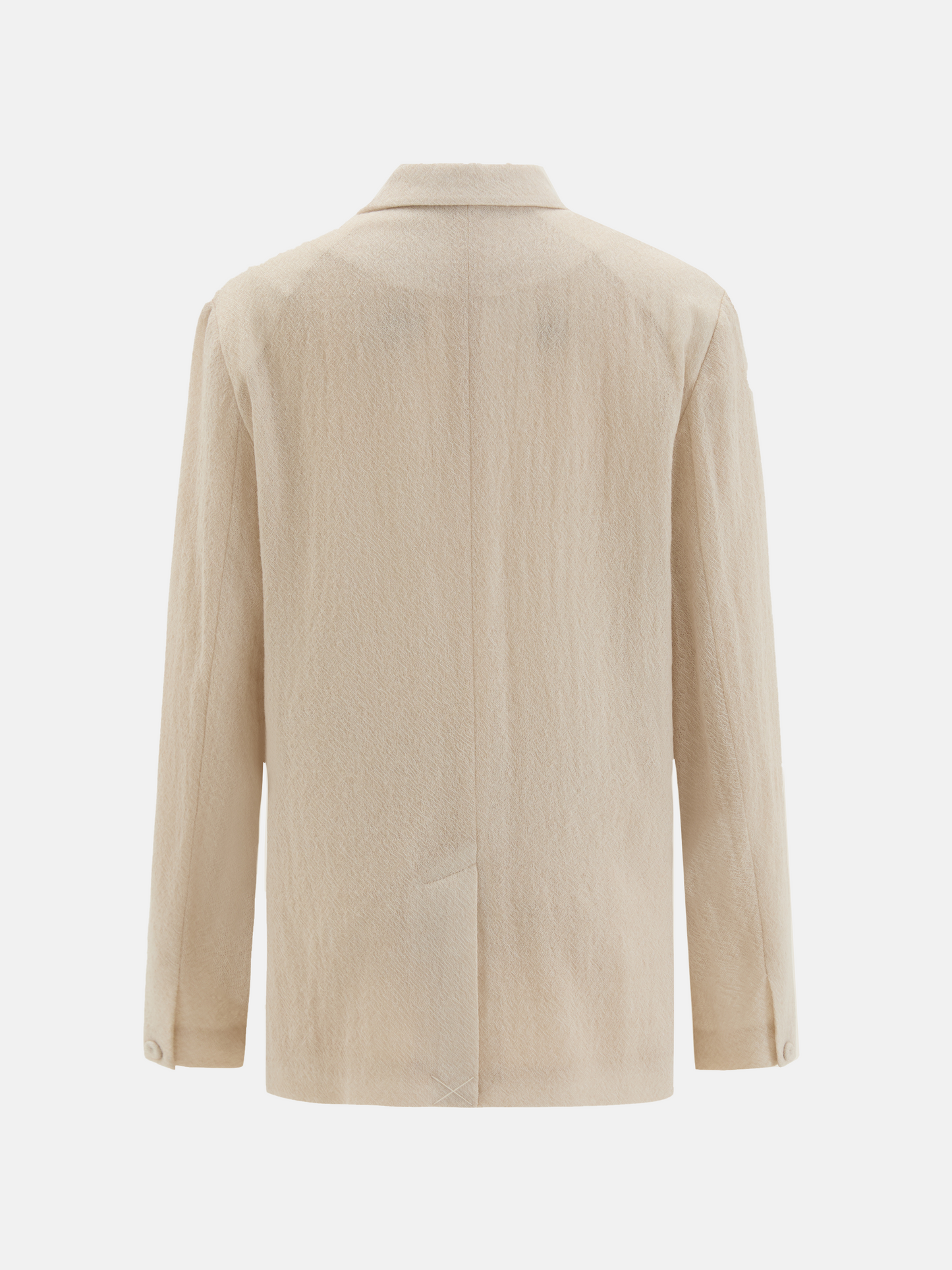 Structured worsted wool jacket with mulberry silk lining, tailored fit, shown on a model in a thoughtful pose.