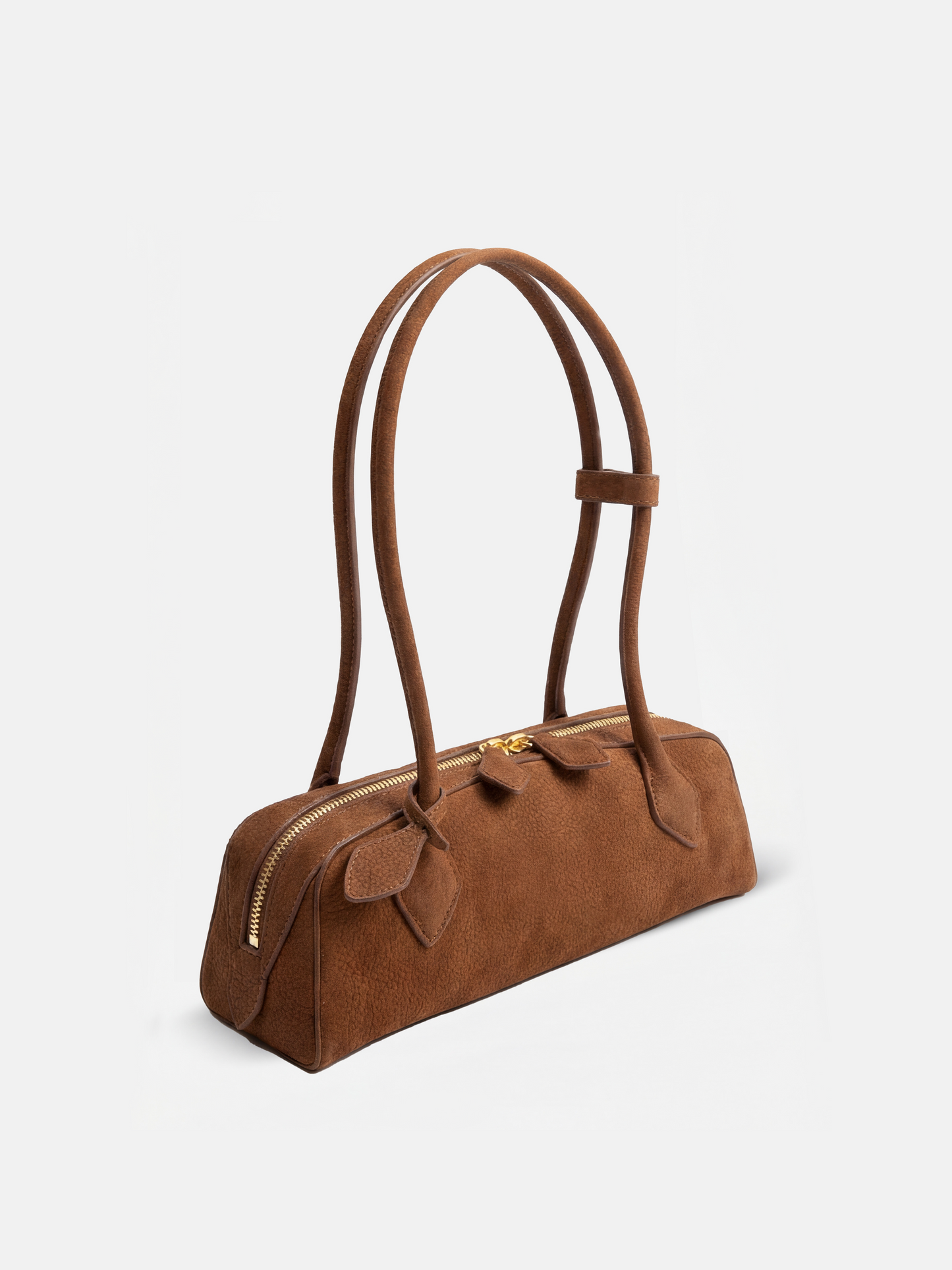 SELVANE Sausage Zipper Shoulder Bag in custom leather, longline, low-profile, softly rounded, with a streamlined zipper top.