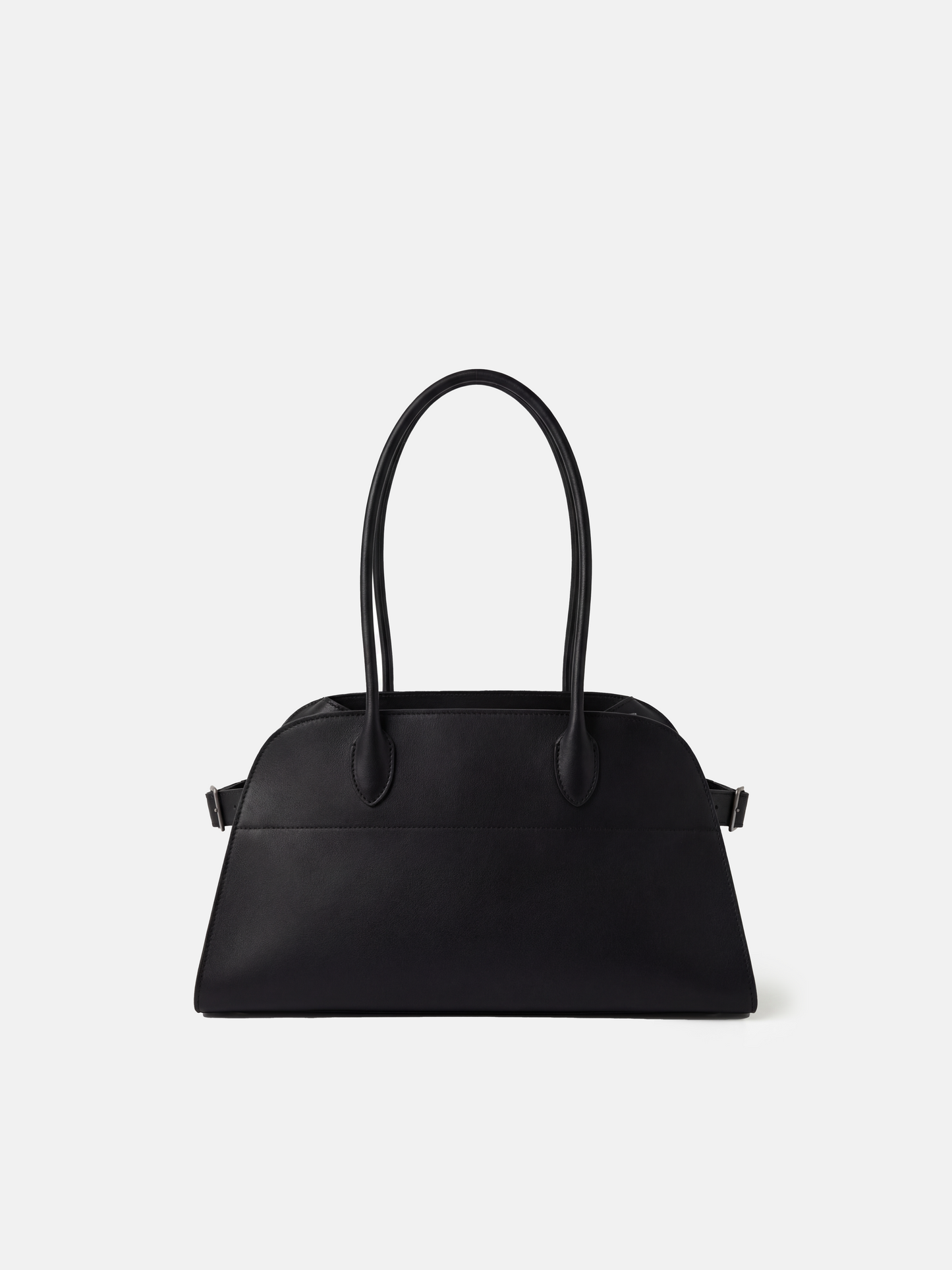 Structured deep navy saddle leather top handle bag with clean curves and elegant trapezoid shape.