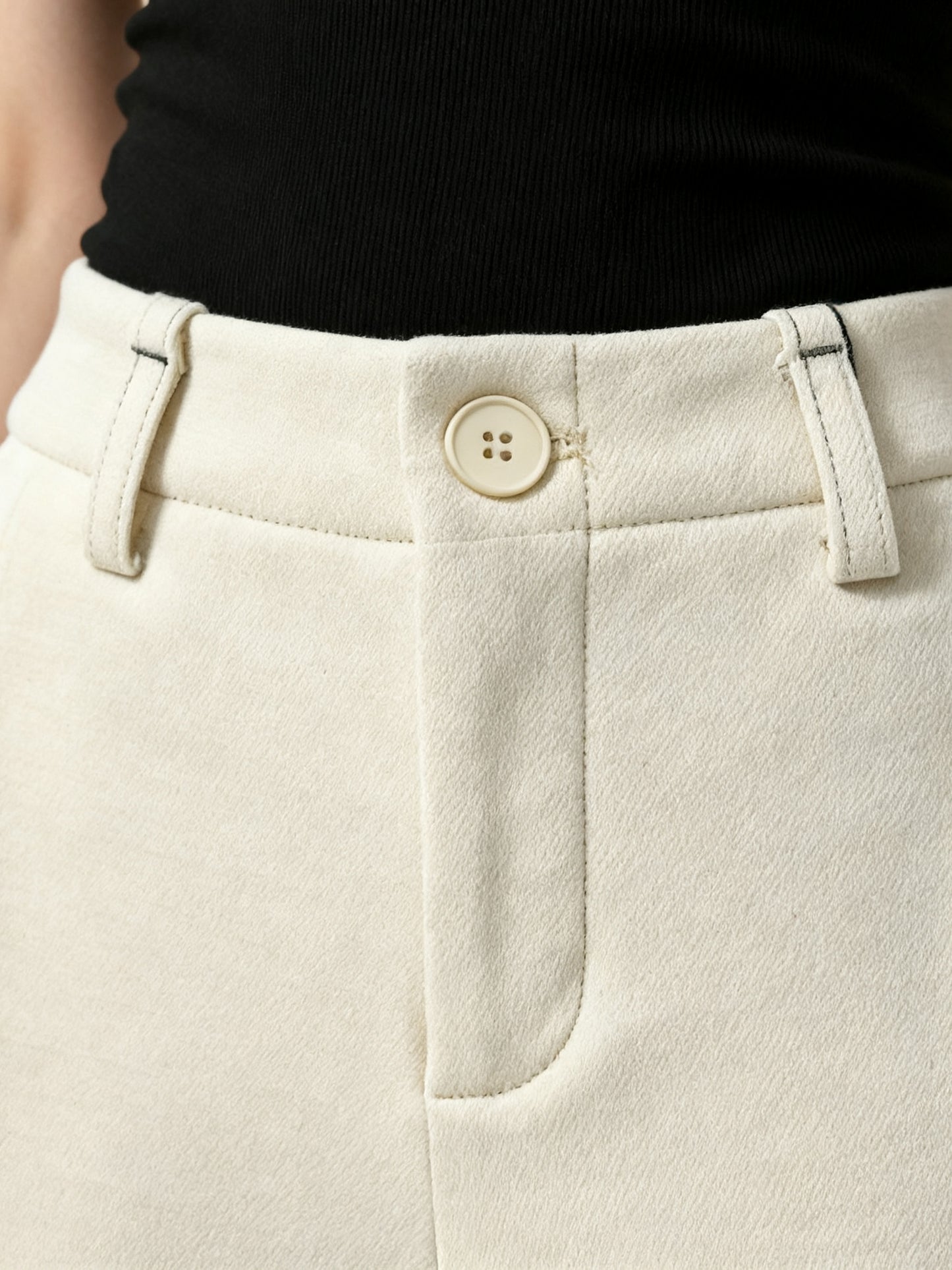 SELVANE Crease-Front Wide-Leg Trousers in a deep hue, showcasing crisp front creases and controlled volume, worn by a model in motion.