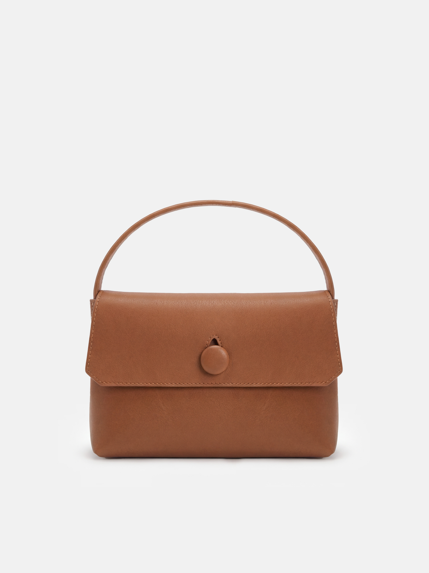 SELVANE Saddle Leather Top-Handle Flap Bag, featuring clean geometry, structured volume, and a precise flap closure.