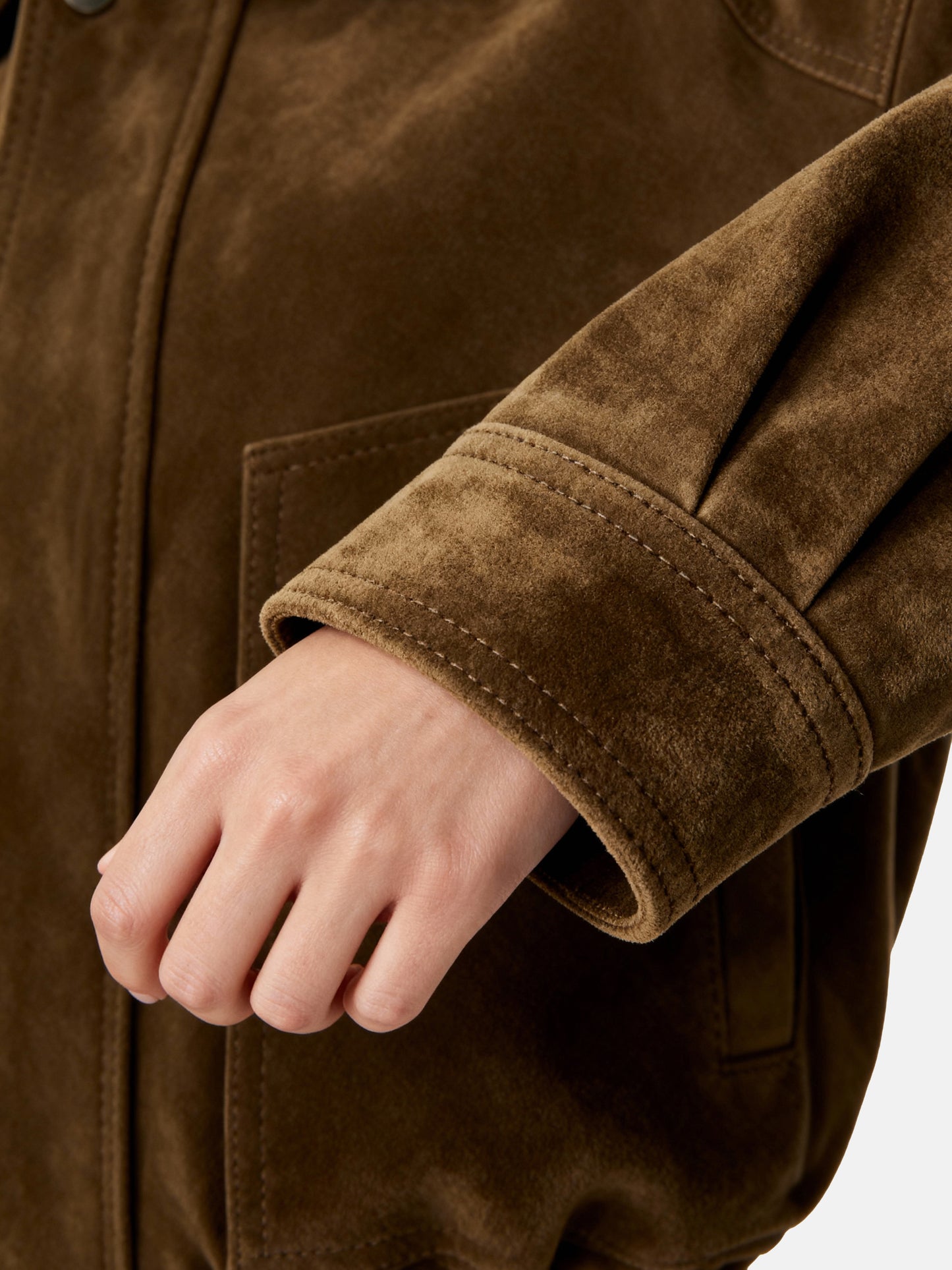 Oversized tan lambskin jacket by SELVANE, featuring a wide pointed collar, ribbed cuffs, and relaxed volume.