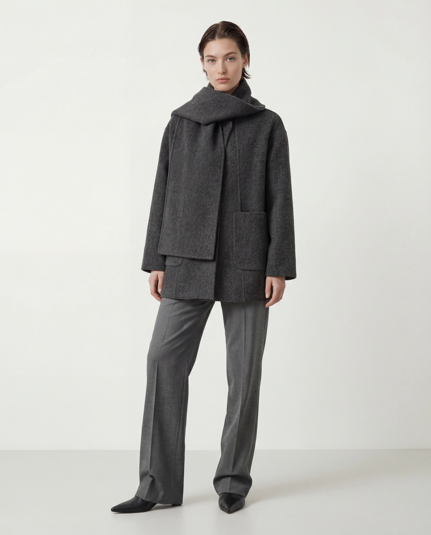 SELVANE Structured Wool Wrap Coat in a neutral tone, featuring a built-in scarf neckline and clean lines, draped elegantly on a figure.