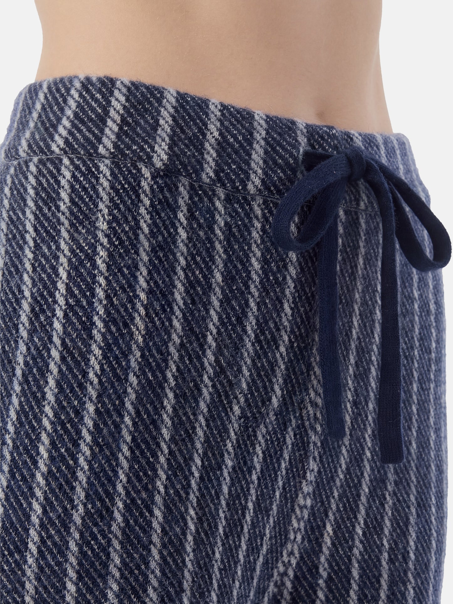 Full-length navy striped cashmere drawstring trousers with a relaxed, straight leg, shown draped cleanly.