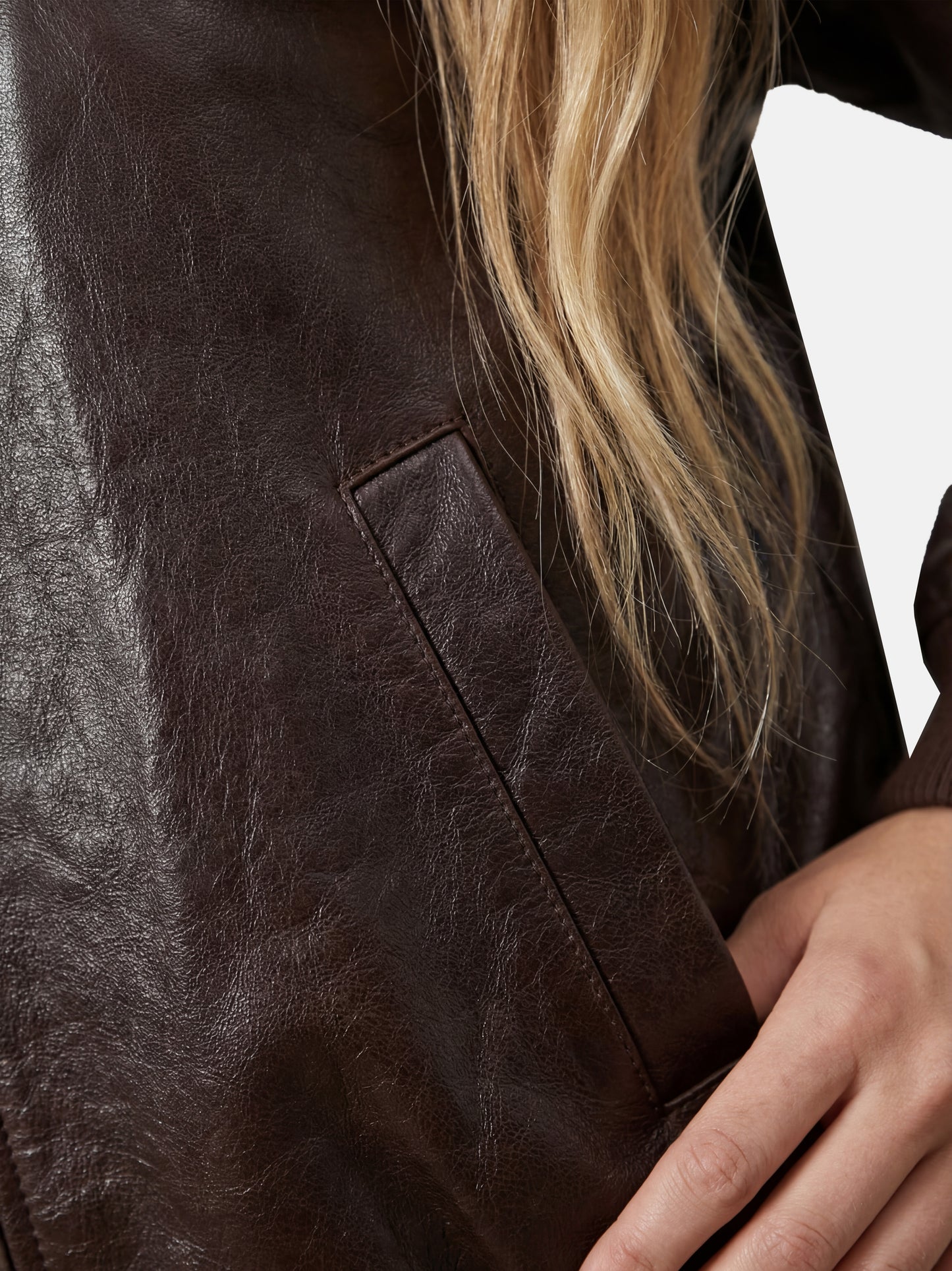 SELVANE men's lamb leather bomber jacket in black, featuring ribbed collar, cuffs, and hem, with a clean zip-front design.