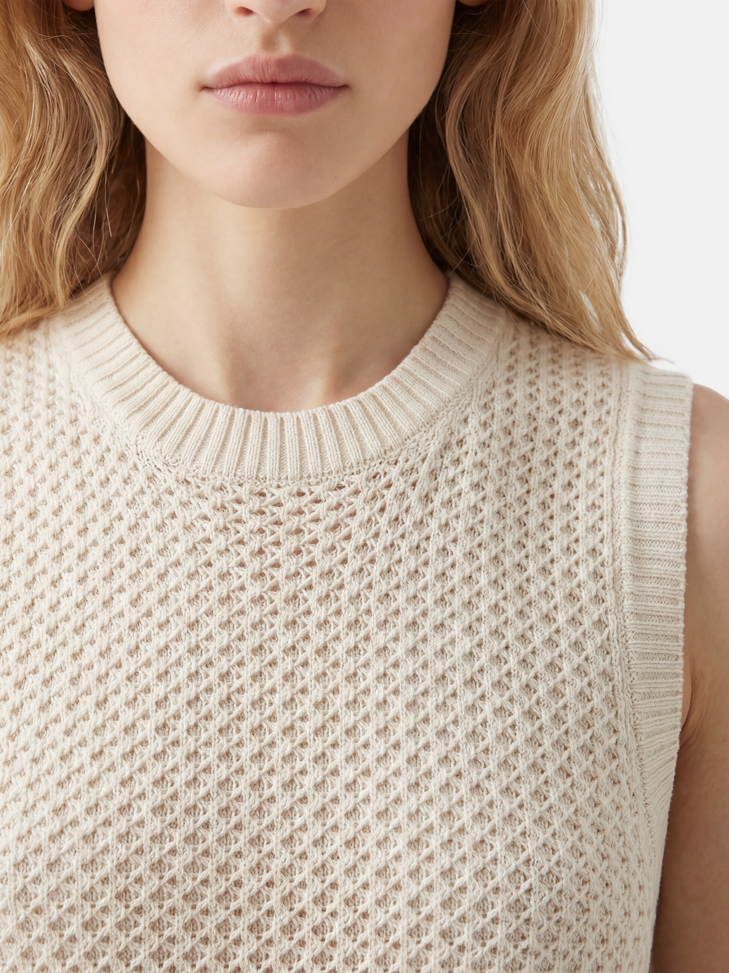 SELVANE Cashmere Open-Knit Sleeveless Maxi Dress in a natural setting, showcasing its elongated fall and airy texture.