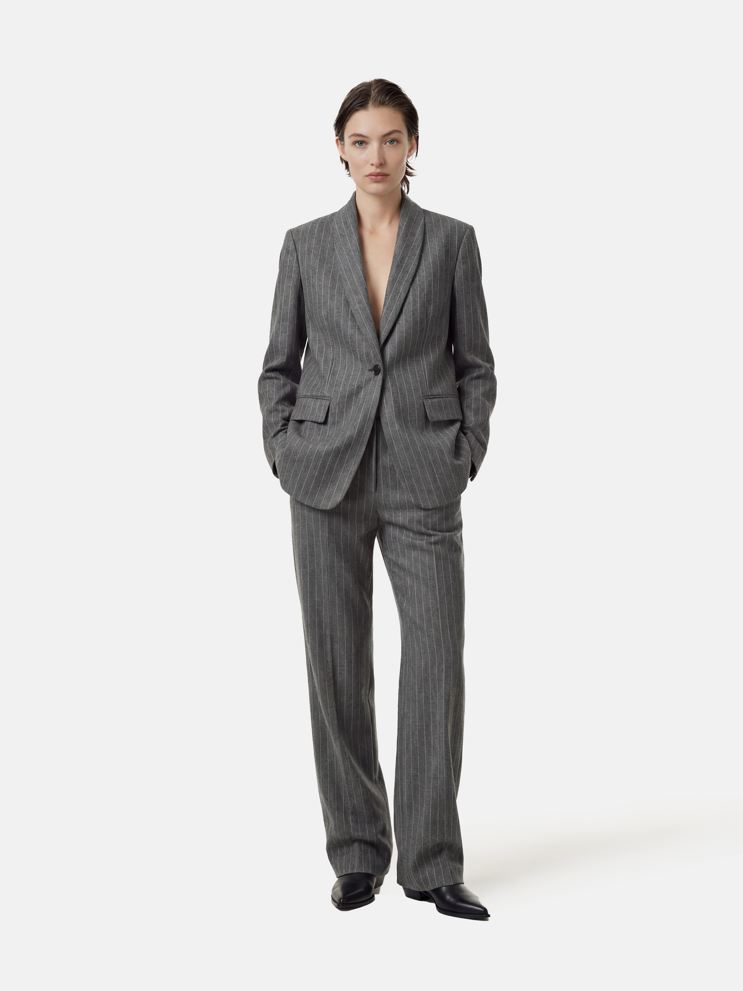SELVANE Pinstripe Wool Blazer, longline with softened peak lapel and single-button front, tailored for a calm, vertical silhouette.