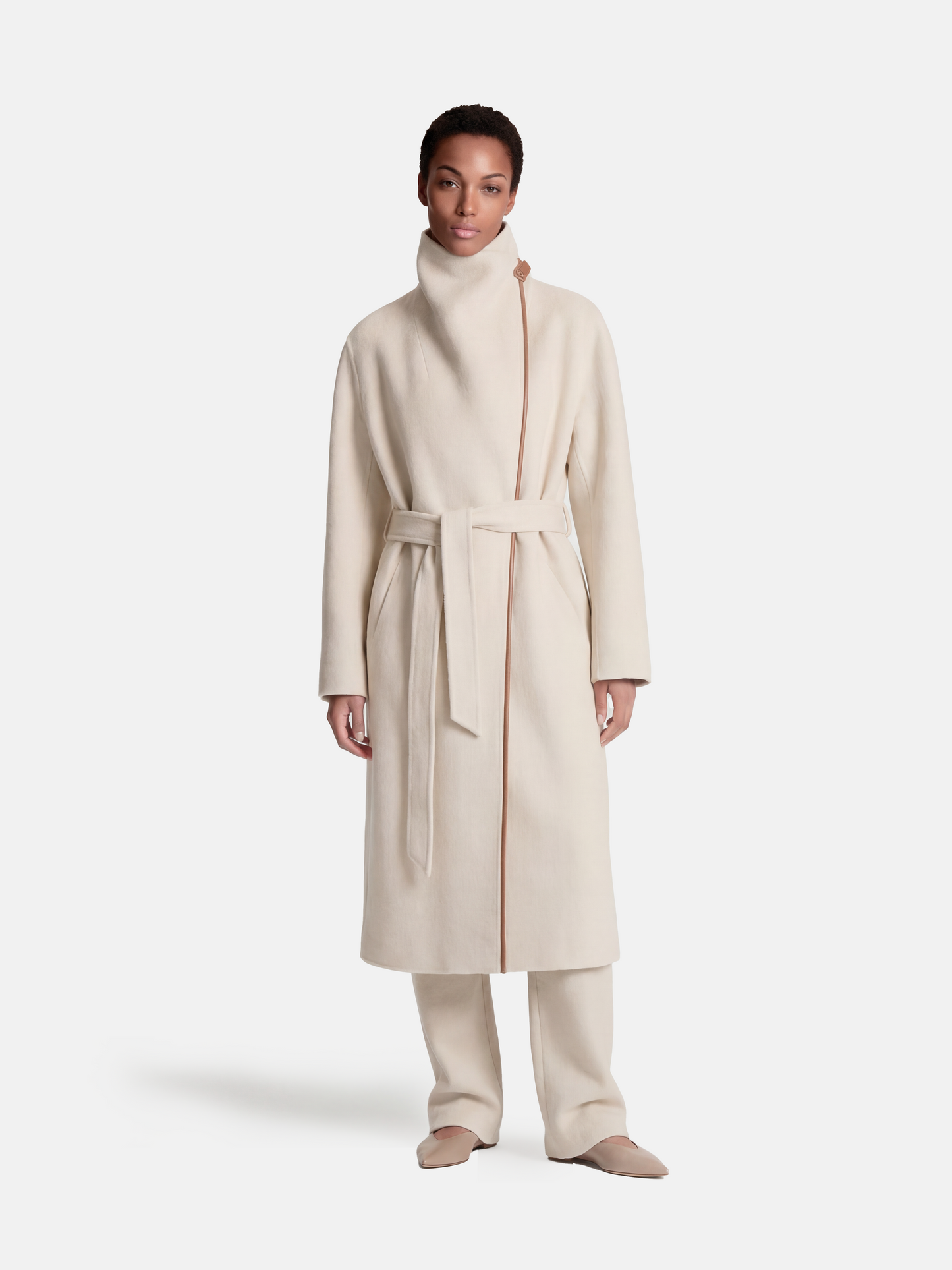 SELVANE Contour Wool Wrap Coat in a light tone with contrast-trim edges and wide shawl collar, draped elegantly.
