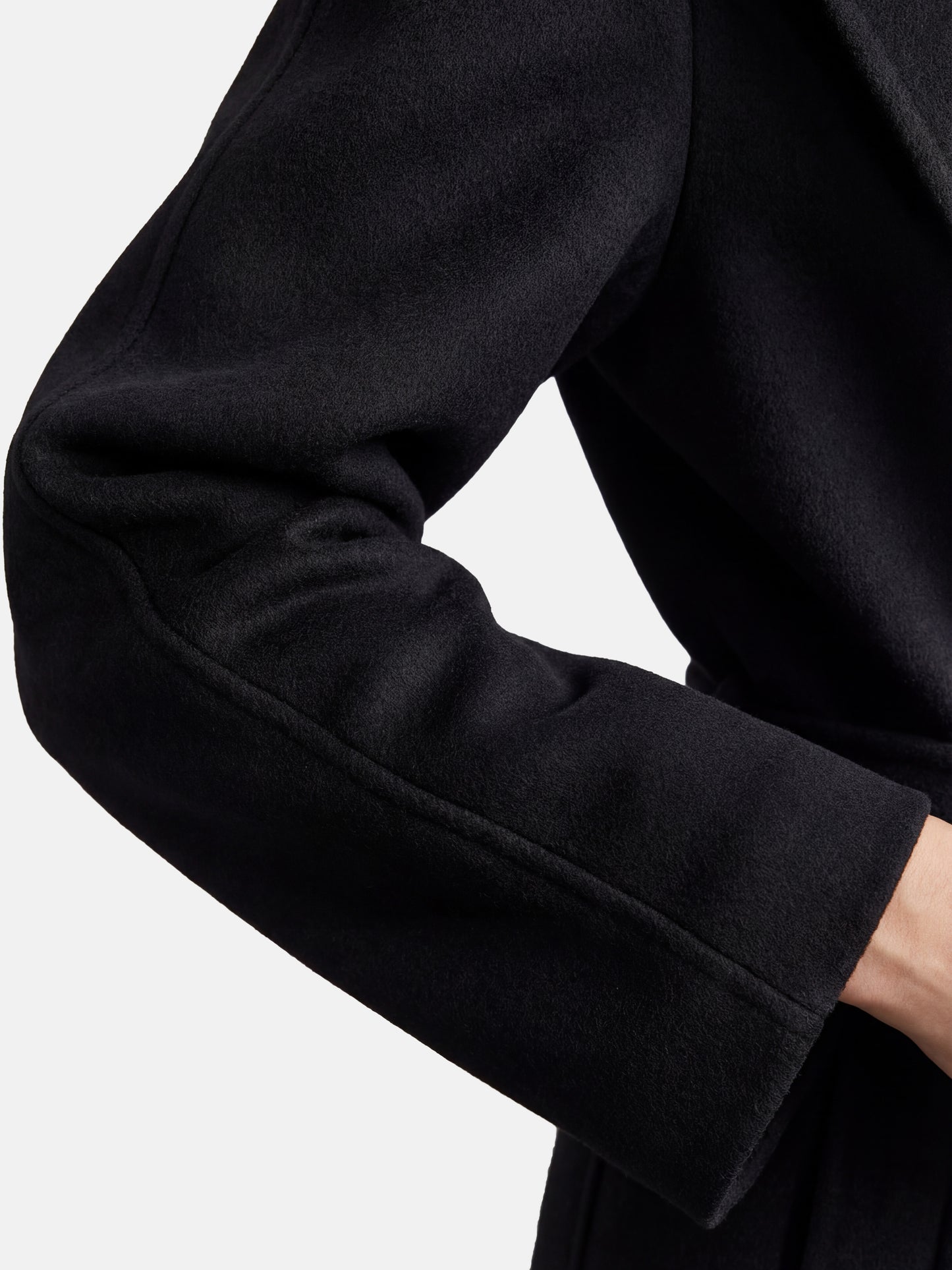 SELVANE mid-length wrap coat in quiet camel pure cashmere, with exaggerated shawl collar and long belt, for elegant motion.