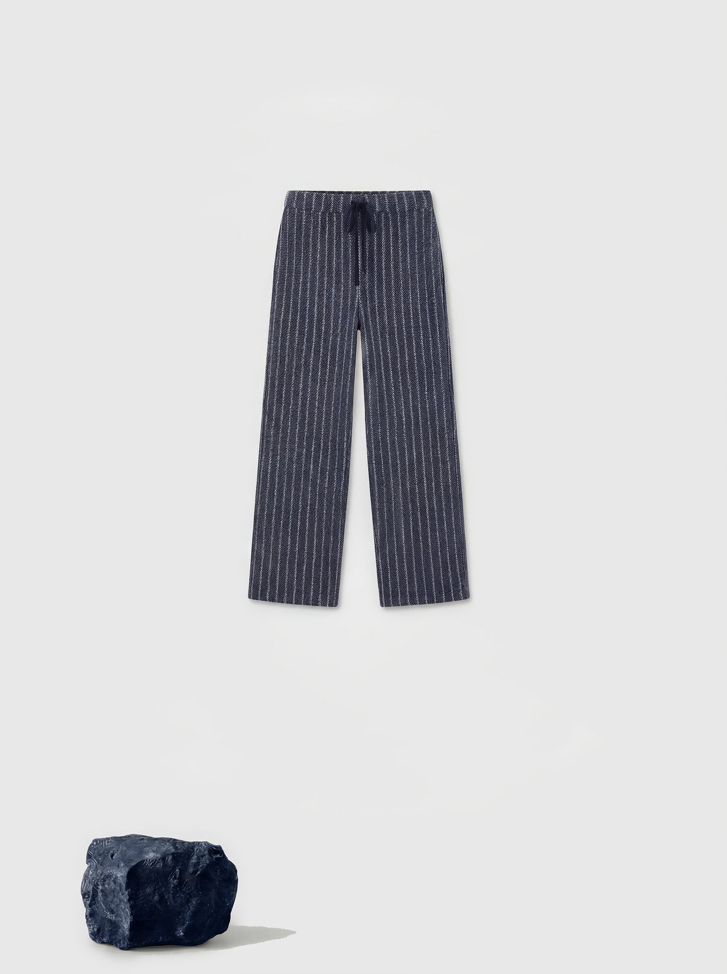 Full-length navy striped cashmere drawstring trousers with a relaxed, straight leg, shown draped cleanly.