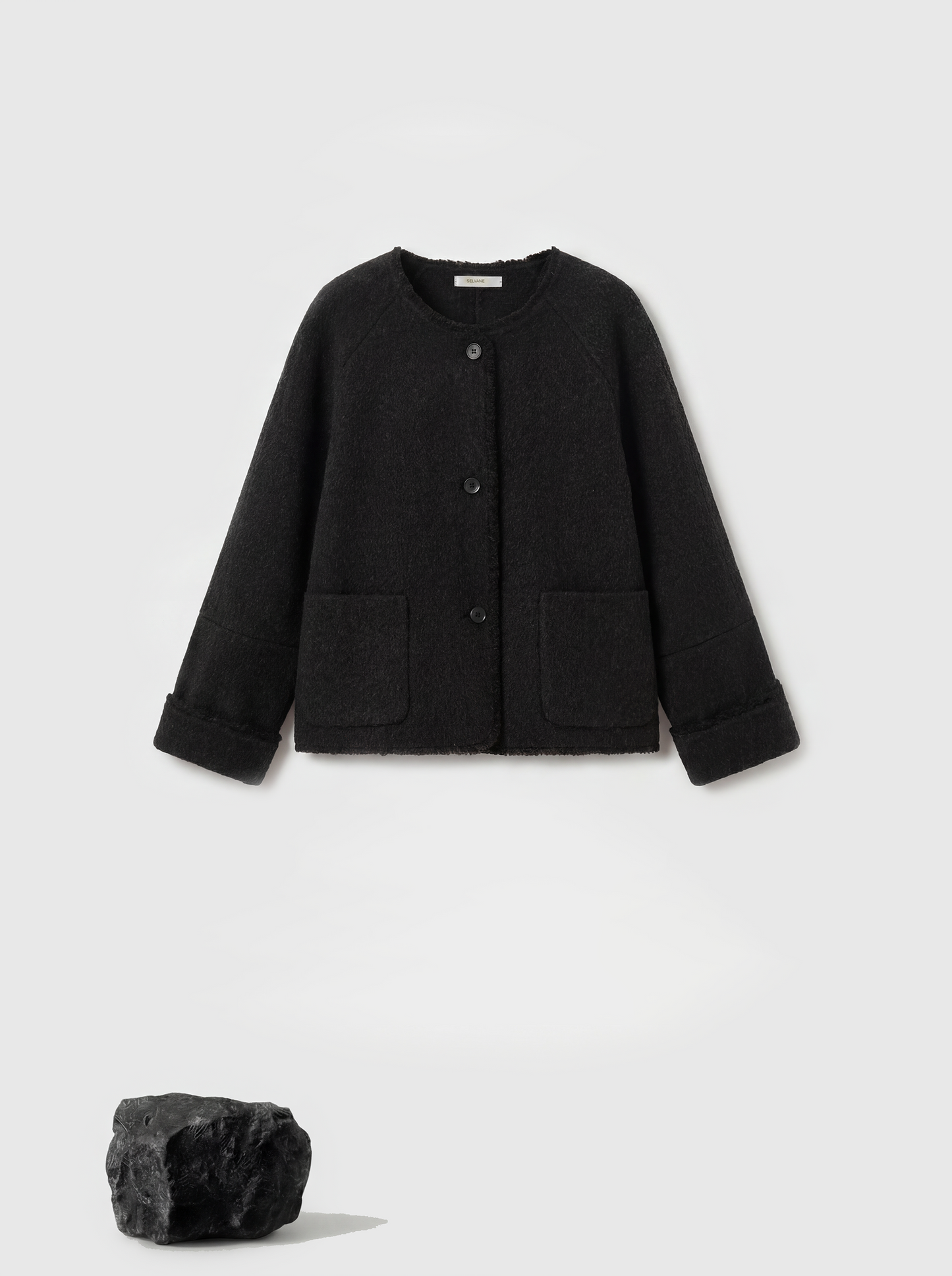 SELVANE Pure Wool Cropped Jacket in a clean round neck, soft boxy lines, and high-hip proportion, showcasing a composed drape.