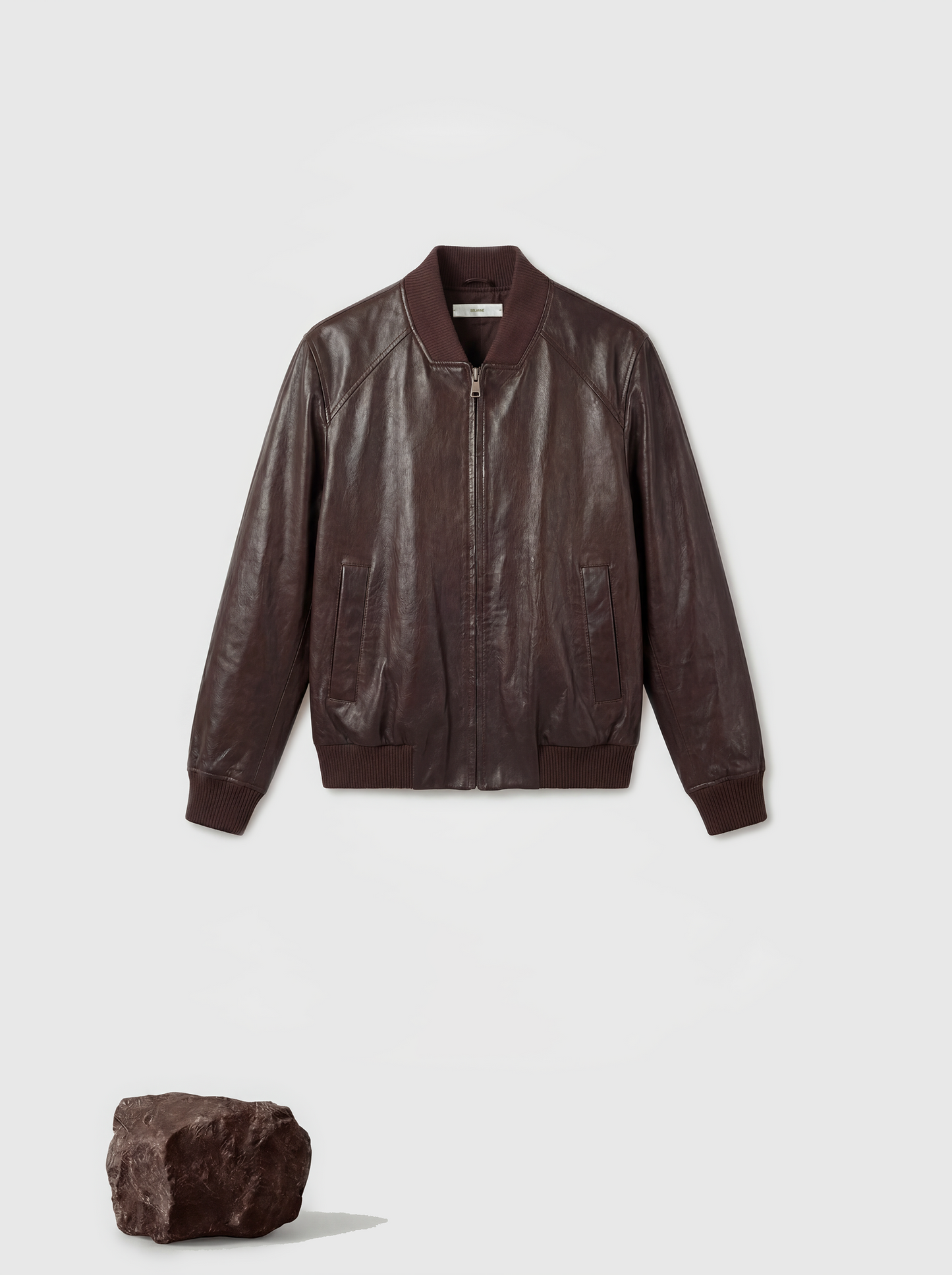 SELVANE men's lamb leather bomber jacket in black, featuring ribbed collar, cuffs, and hem, with a clean zip-front design.