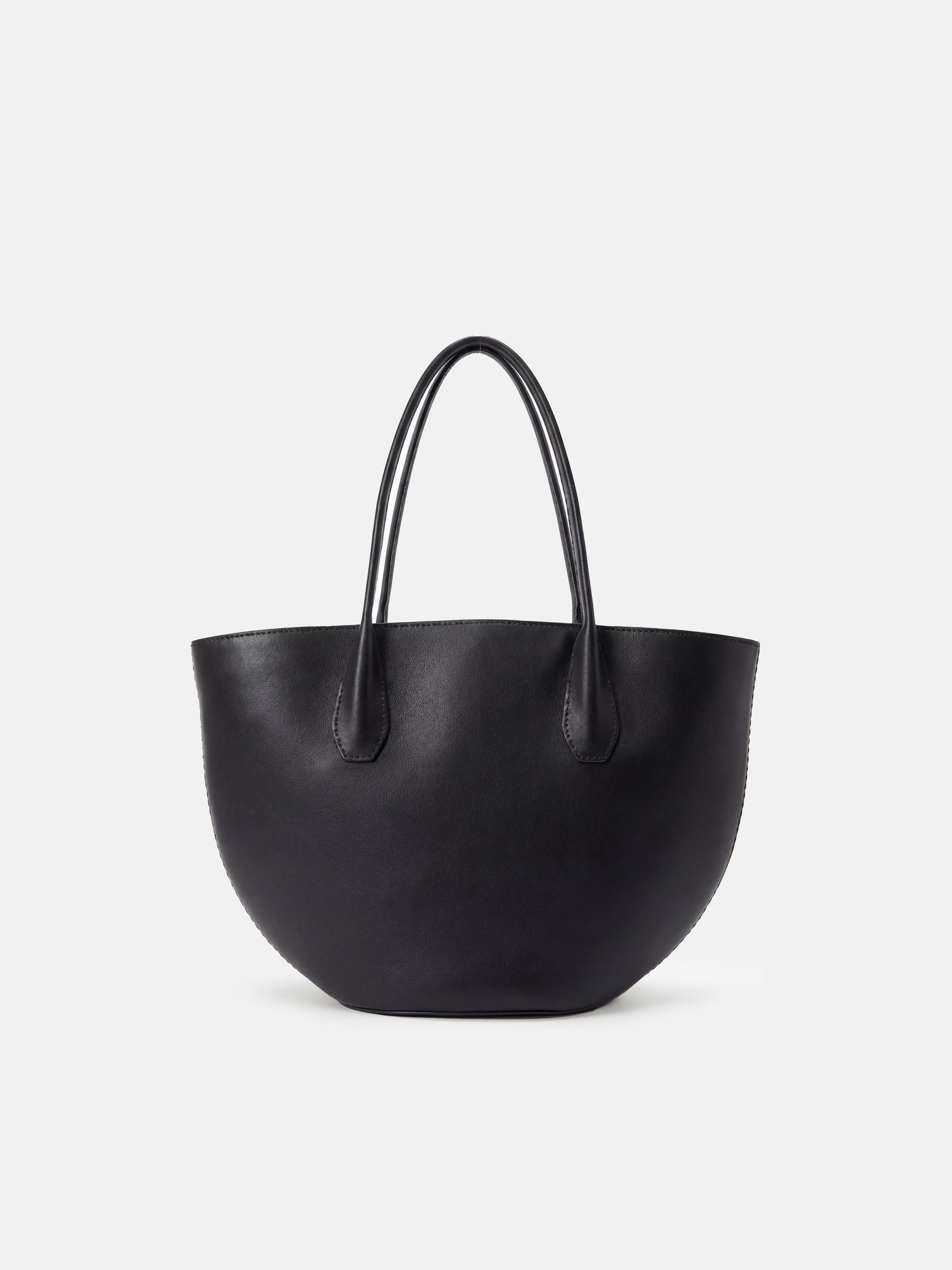 SELVANE Saddle Leather Crescent Tote Bag, featuring clean curvature, a grounded base, and long handles.