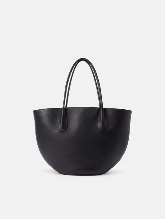 SELVANE Saddle Leather Crescent Tote Bag, featuring clean curvature, a grounded base, and long handles.