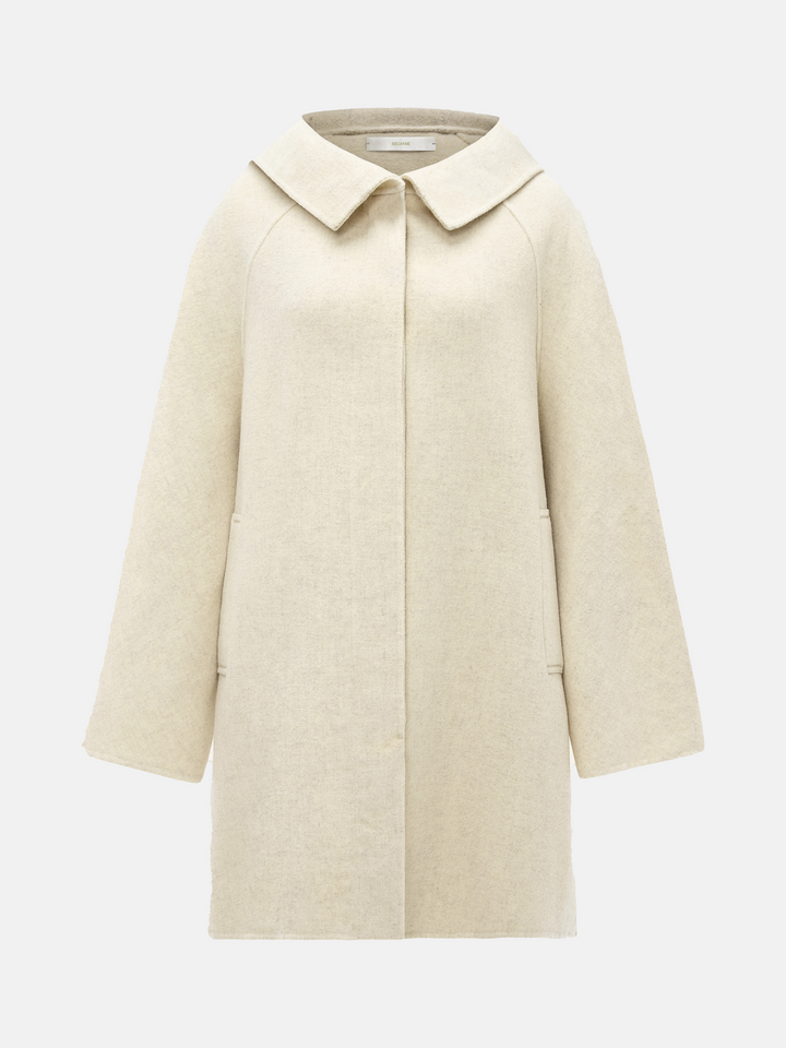SELVANE cream wool-cashmere hooded coat, A-line silhouette, oversized hood, elegant and serene.