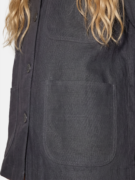 SELVANE Linen Work Shirt Jacket in a natural hue, featuring a clean-lined silhouette and four quiet utility pockets, embodying practical geometry.