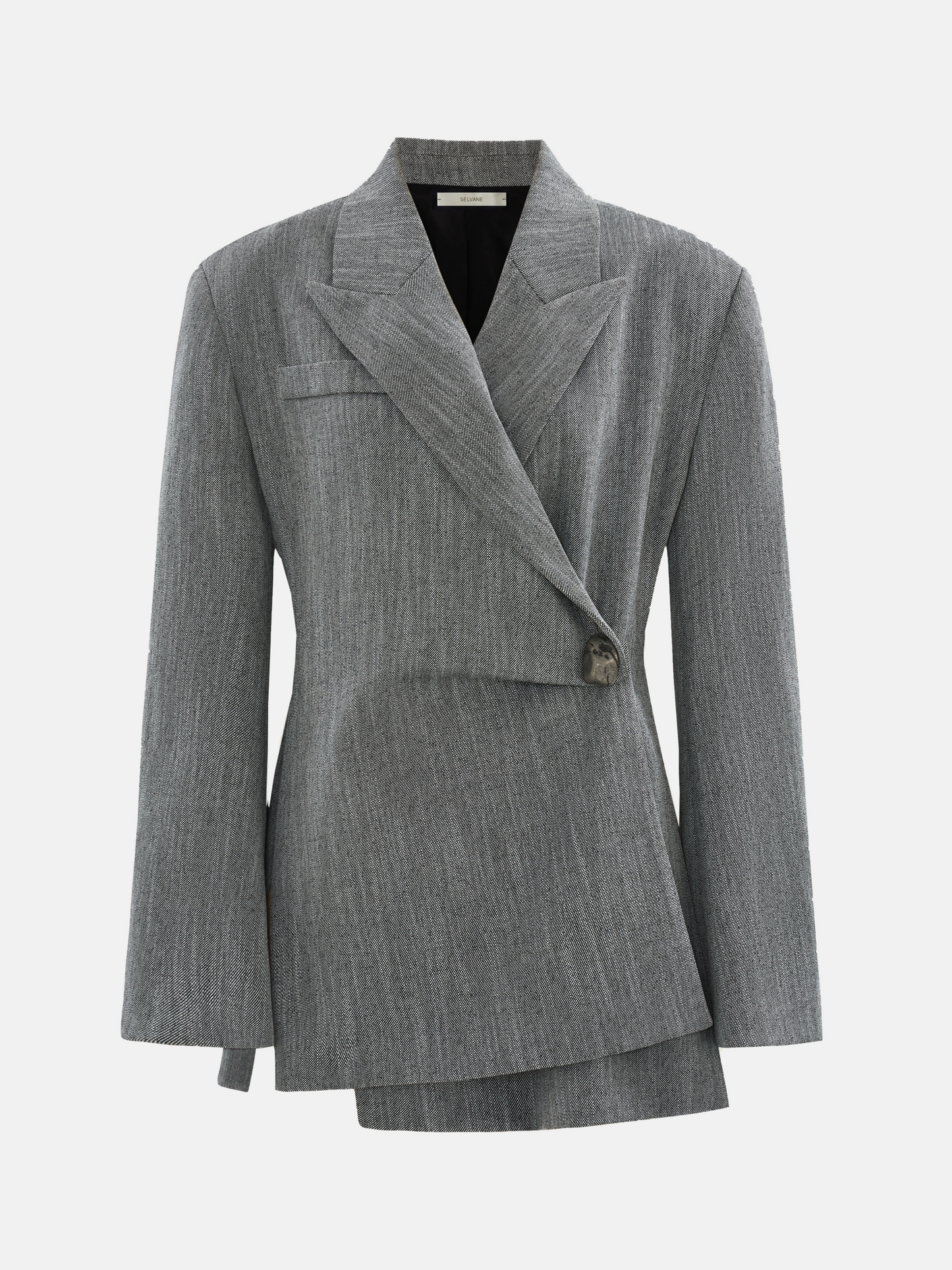 SELVANE Diagonal-Closure Asymmetric Collar Blazer in quiet grey. Sharp shoulders, diagonal closure, and asymmetric collar define its long, clean silhouette.