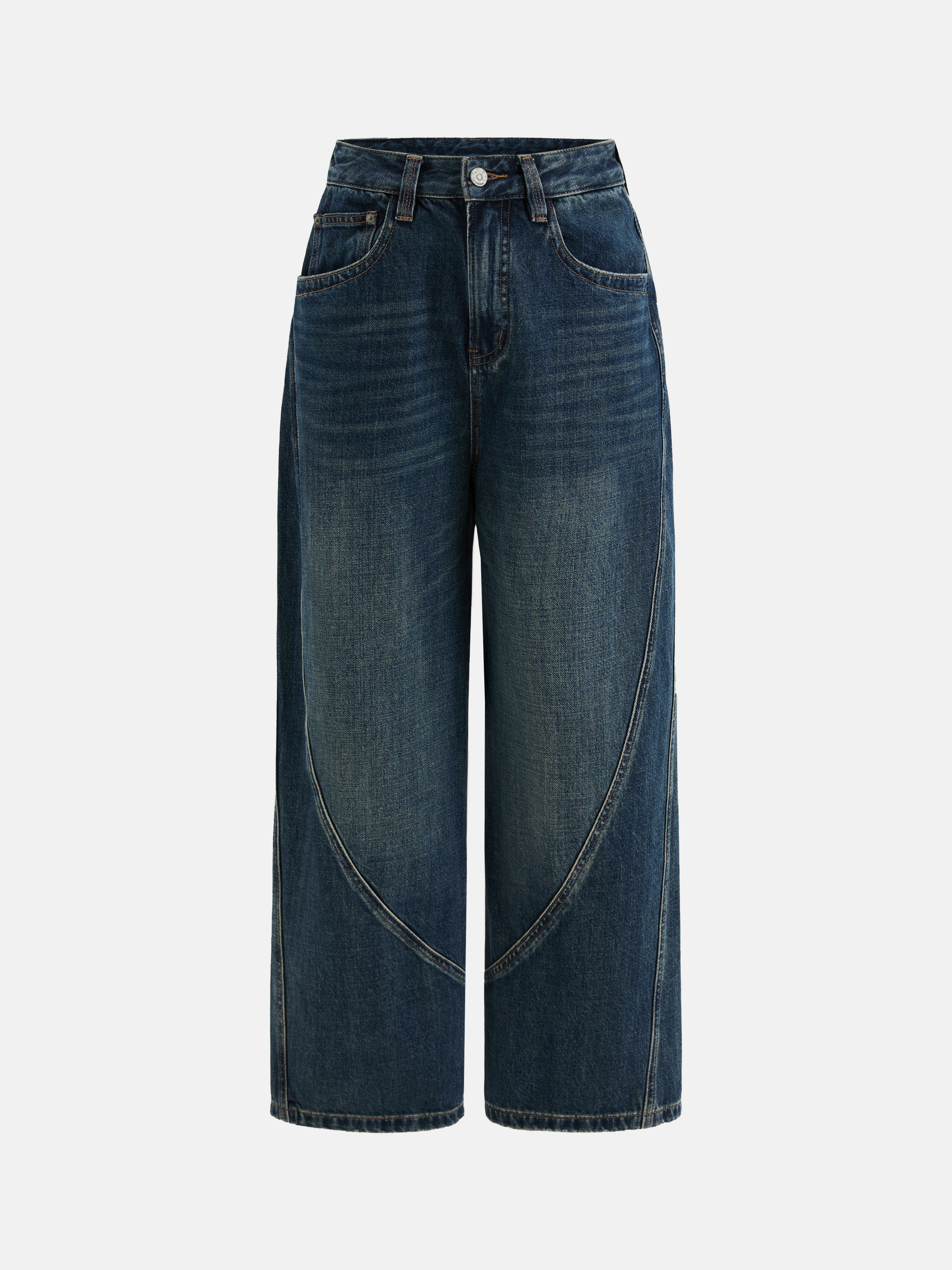 Model wearing high-rise SELVANE Sculpted Seam Wide-Leg Jeans in mid-wash pure cotton denim, showcasing the curved front seams.