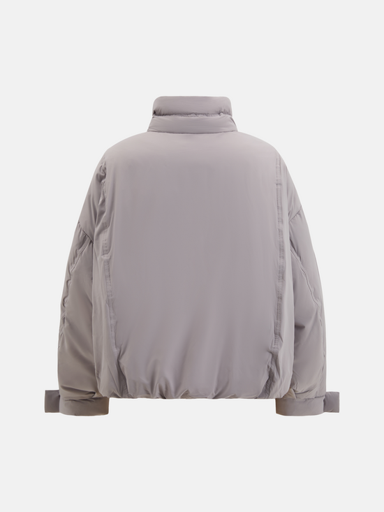 SELVANE High-Neck Bomber Down Jacket in black, featuring an exaggerated high collar and rounded silhouette, refined matte finish.