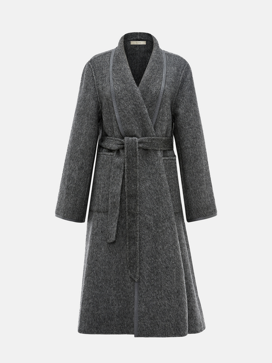 SELVANE Belted Wool Long Coat in a soft wool-llama blend, featuring a fluid drape and clean topstitched edges, worn by a model in a composed stance.