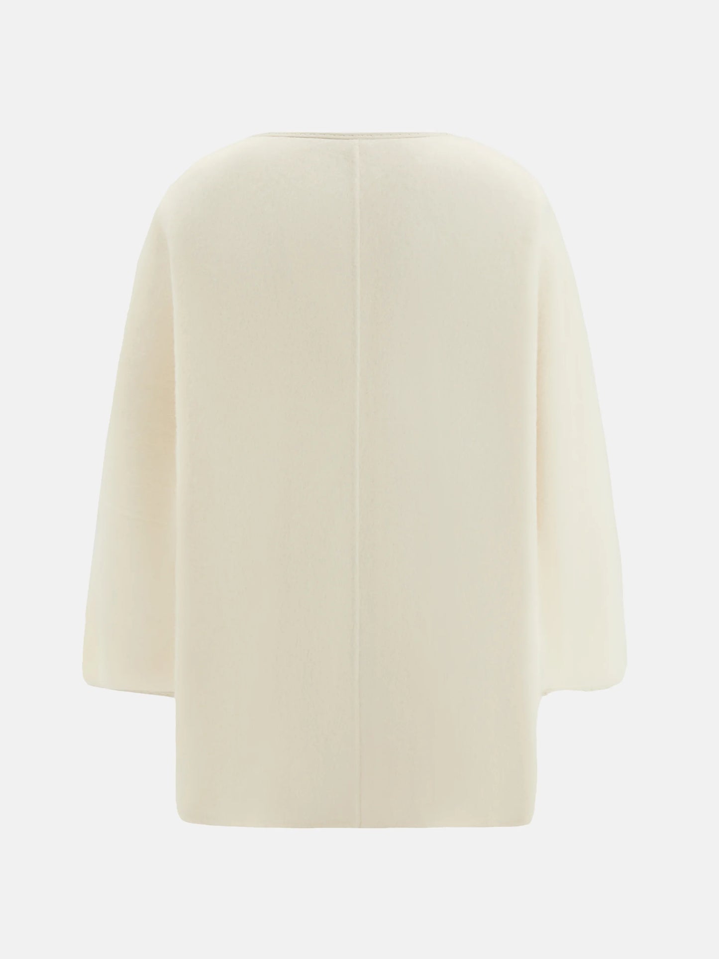 SELVANE asymmetric single-button wool coat in calm ivory, featuring a clear line and composed silhouette.