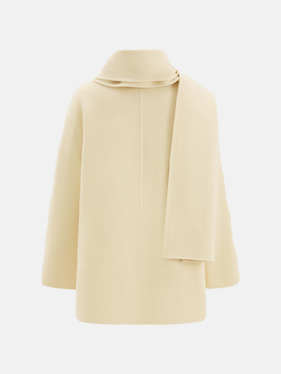 SELVANE Structured Wool Wrap Coat in a neutral tone, featuring a built-in scarf neckline and clean lines, draped elegantly on a figure.