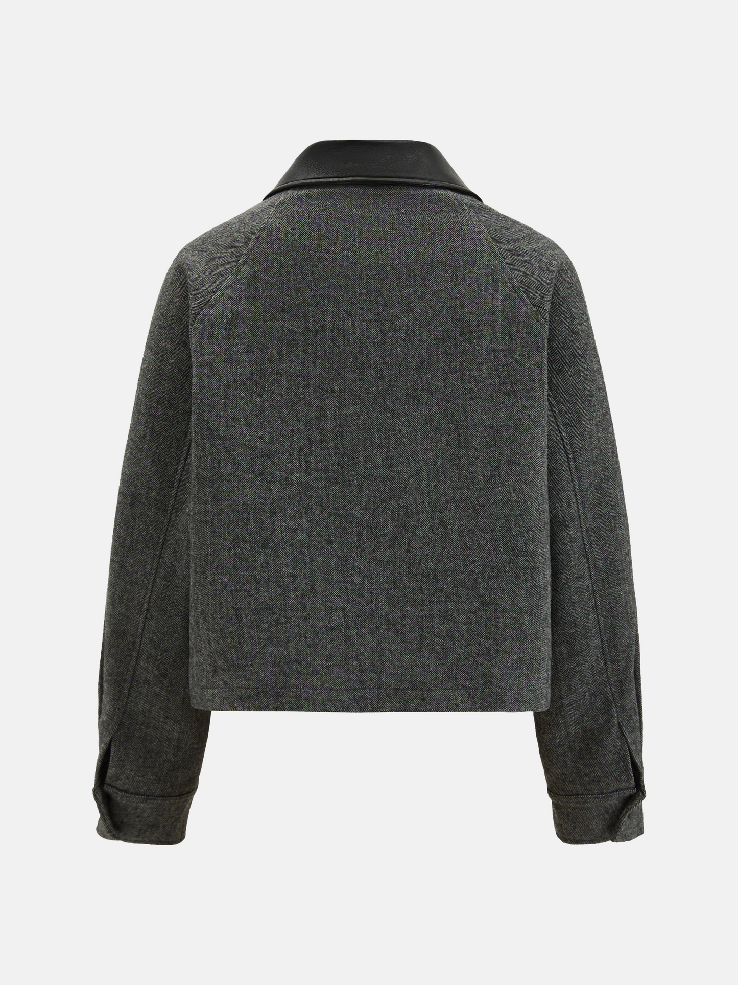 Charcoal wool-blend two-piece set featuring a cropped, boxy jacket with a sharp faux-leather contrast collar and a clean straight skirt.