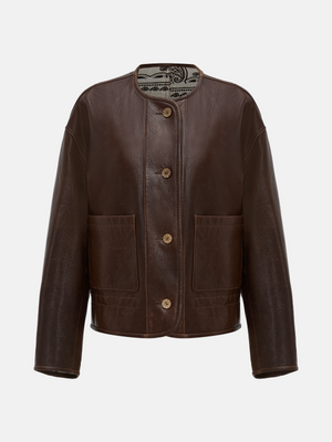 SELVANE brown lambskin crew-neck jacket with softened volume and drawstring hem, showcasing clean lines and supple texture.