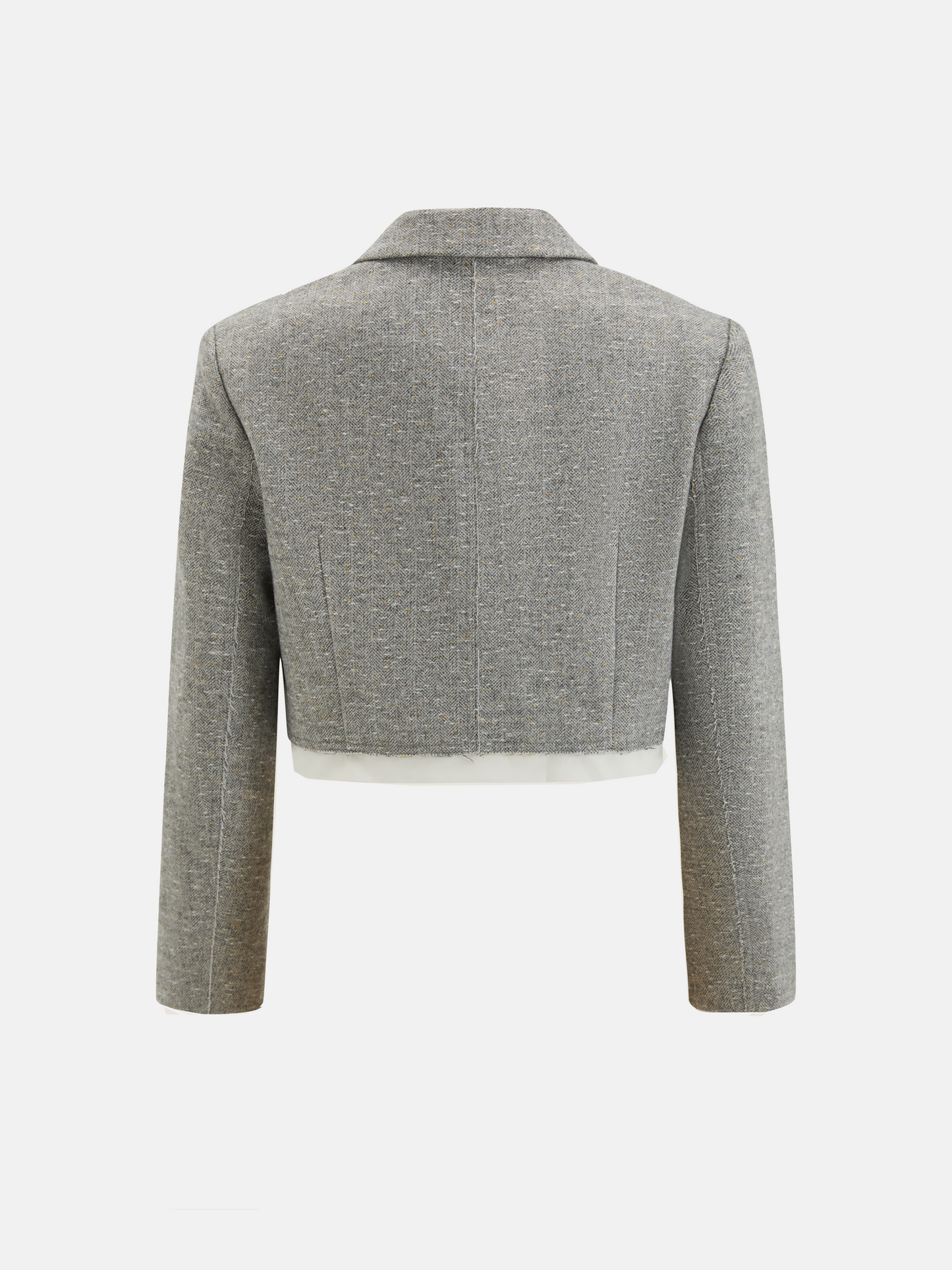 Cropped blazer and wrap midi skirt set in grey, featuring disciplined shoulders and fluid lines, inspired by volcanic terrain.