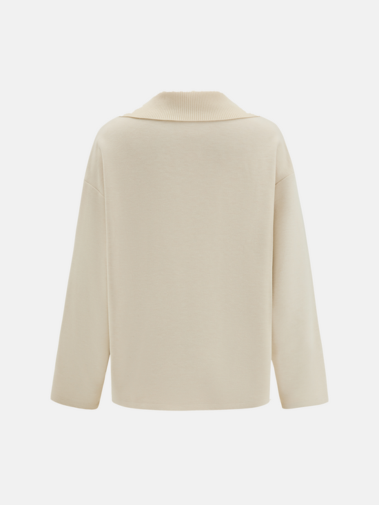 Off-white SELVANE Collared Knit Pullover and Wide-Leg Pants Set, featuring a V-neck and fluid silhouette.