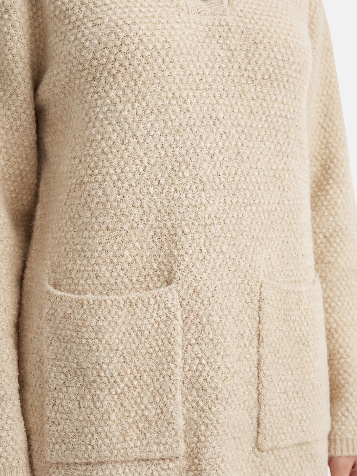 SELVANE Cashmere Textured Henley Sweater in a relaxed fit, featuring a clean round neck, subtle button placket, and visible pebbled texture, designed for calm daily wear.