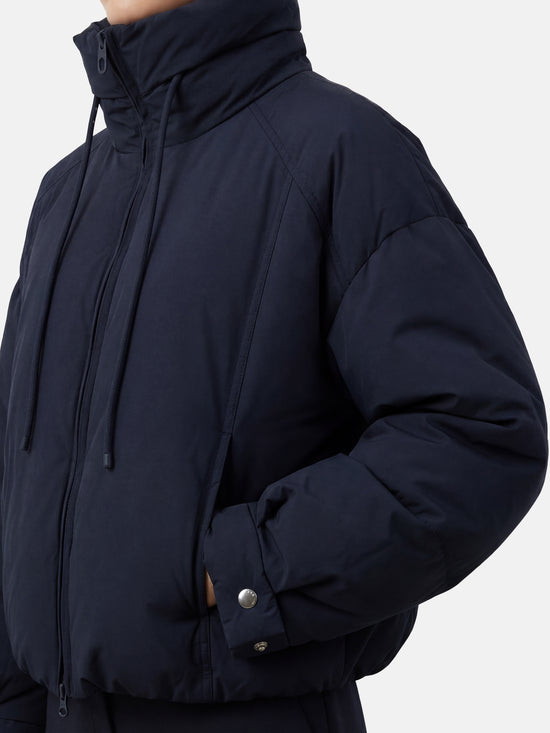 SELVANE High-Neck Bomber Down Jacket in black, featuring an exaggerated high collar and rounded silhouette, refined matte finish.