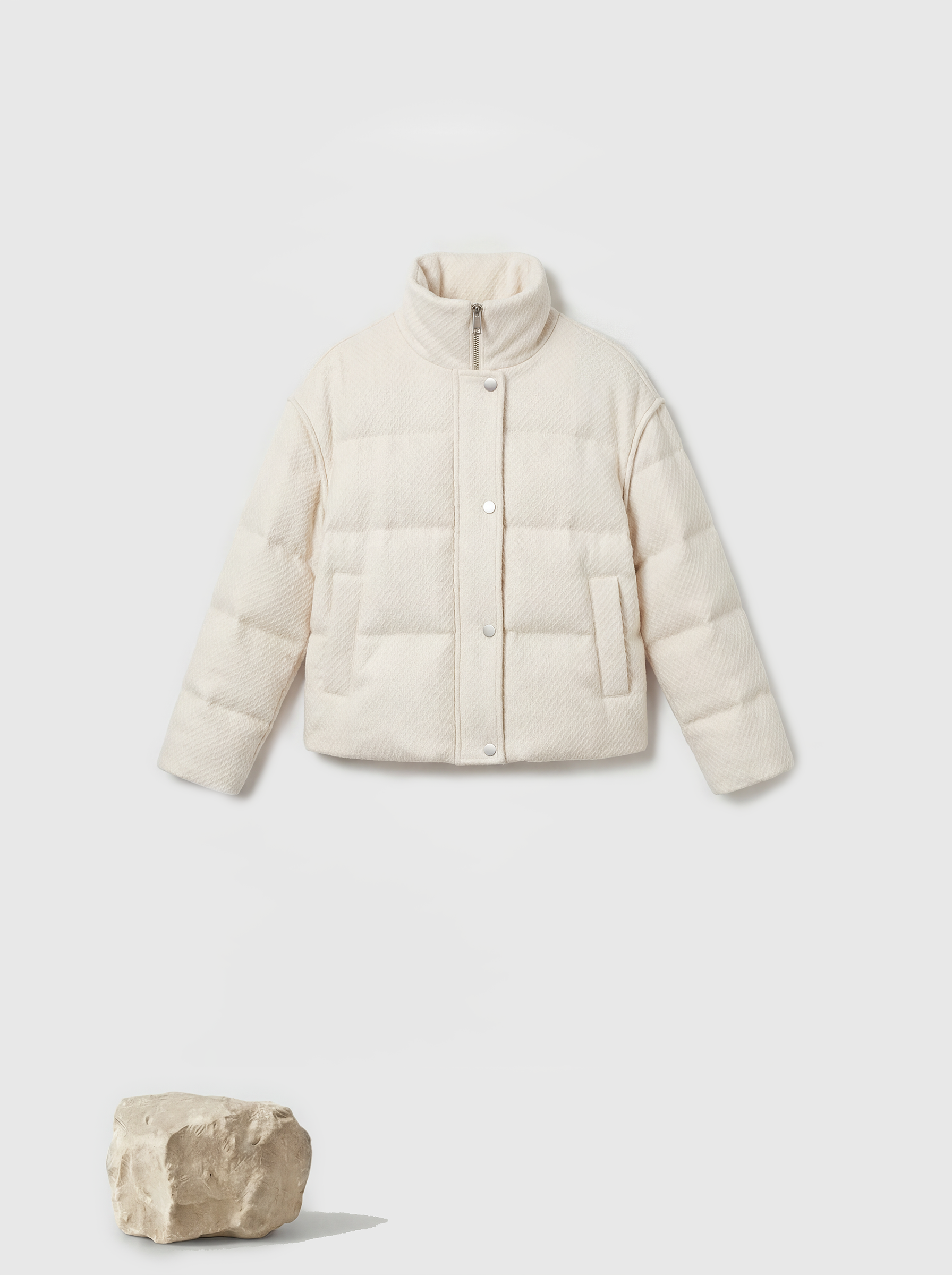 SELVANE Minimal Padded Down Jacket, cropped with a subtle stand collar, crisp panel quilting, and a soft matte finish, embodying sculptural volume.