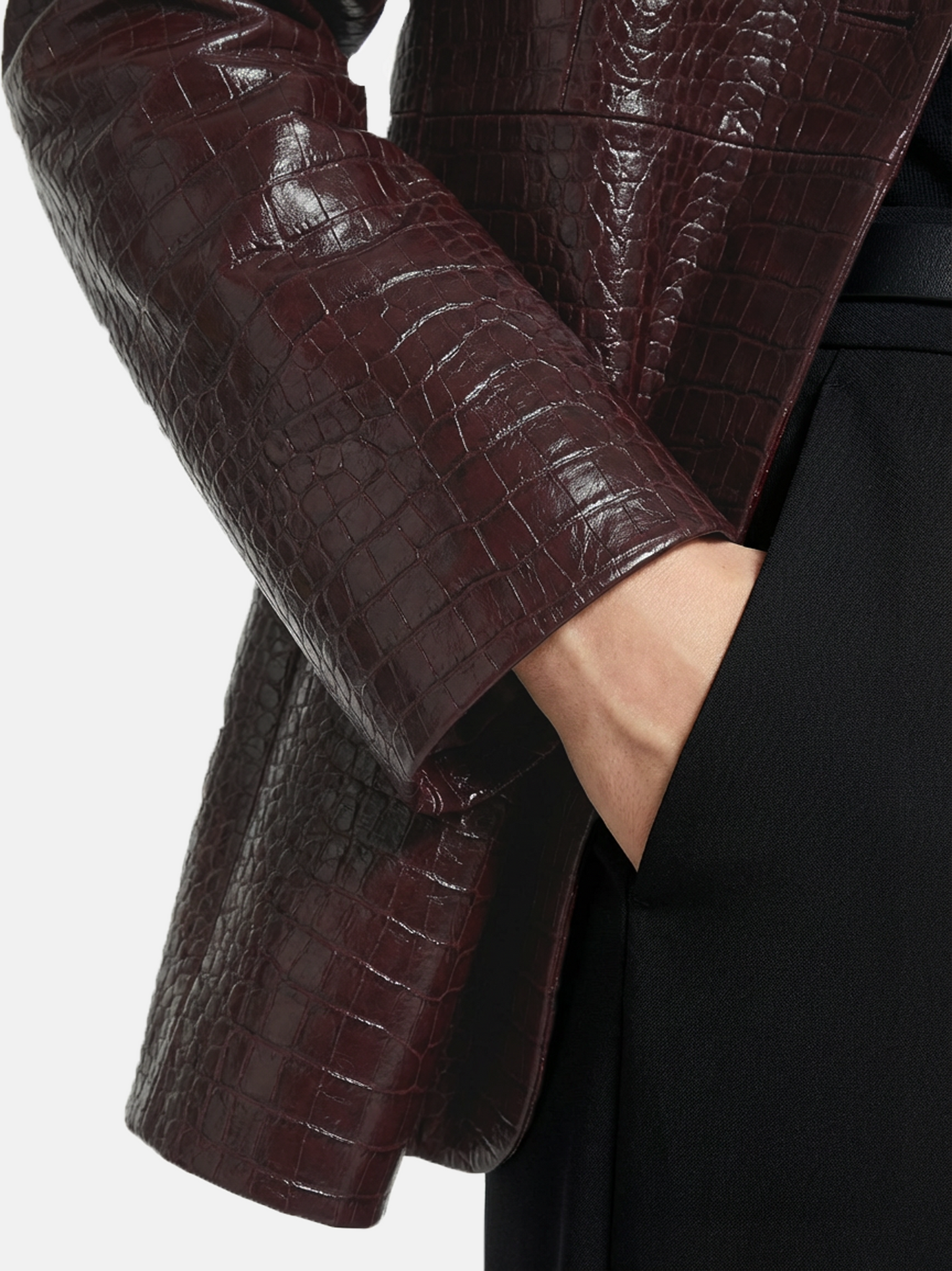 Deep oxblood embossed lambskin V-neck jacket, collarless with a single closure, shown on a model.