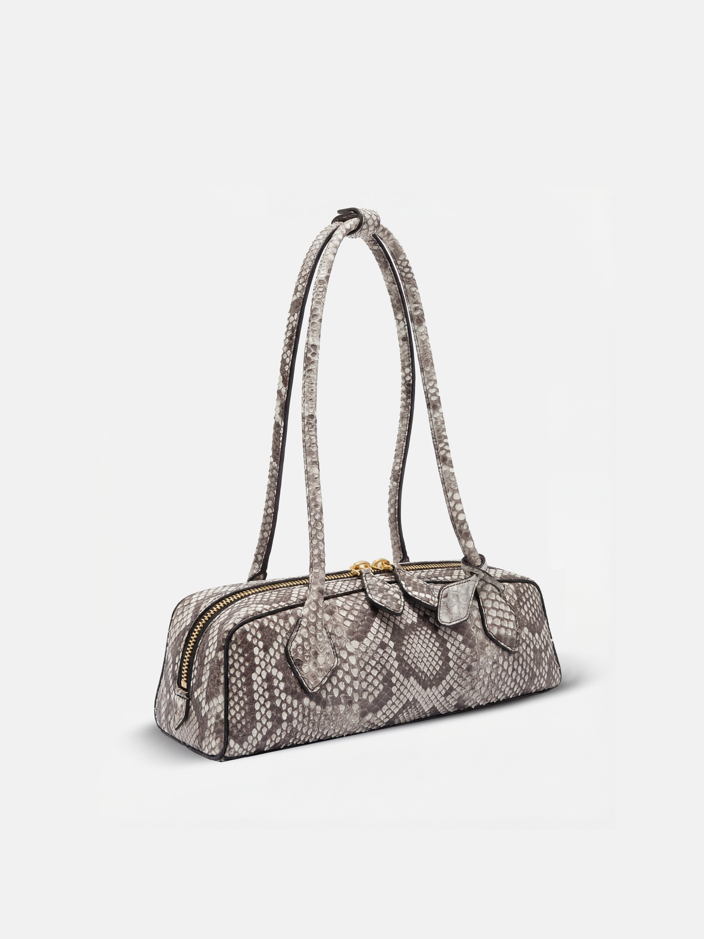 SELVANE Snake Scale Zip Baguette Bag, a slim, structured silhouette with unique scale texture and secure zip-top, worn under arm.