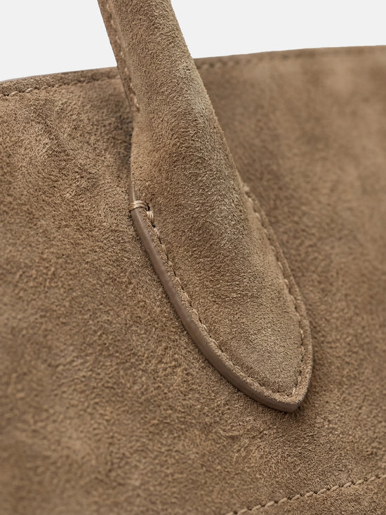SELVANE Arched Suede Top-Handle Bag, featuring a domed silhouette and velvet-touch surface, presented on a minimalist background.