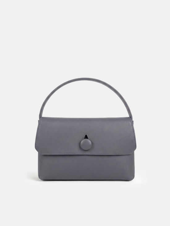 SELVANE Saddle Leather Top-Handle Flap Bag, featuring clean geometry, structured volume, and a precise flap closure.