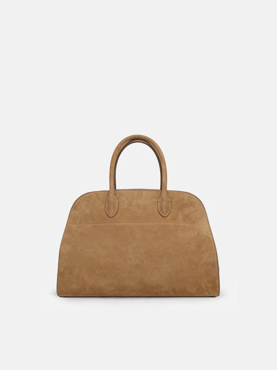 SELVANE Arched Suede Top-Handle Bag, featuring a domed silhouette and velvet-touch surface, presented on a minimalist background.