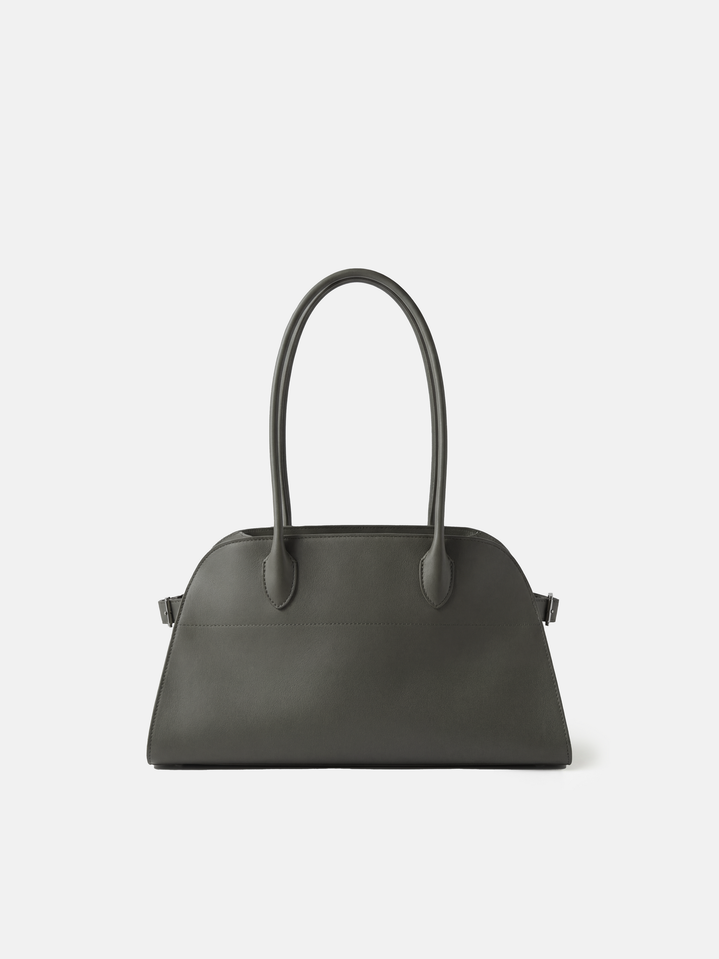 Structured deep navy saddle leather top handle bag with clean curves and elegant trapezoid shape.