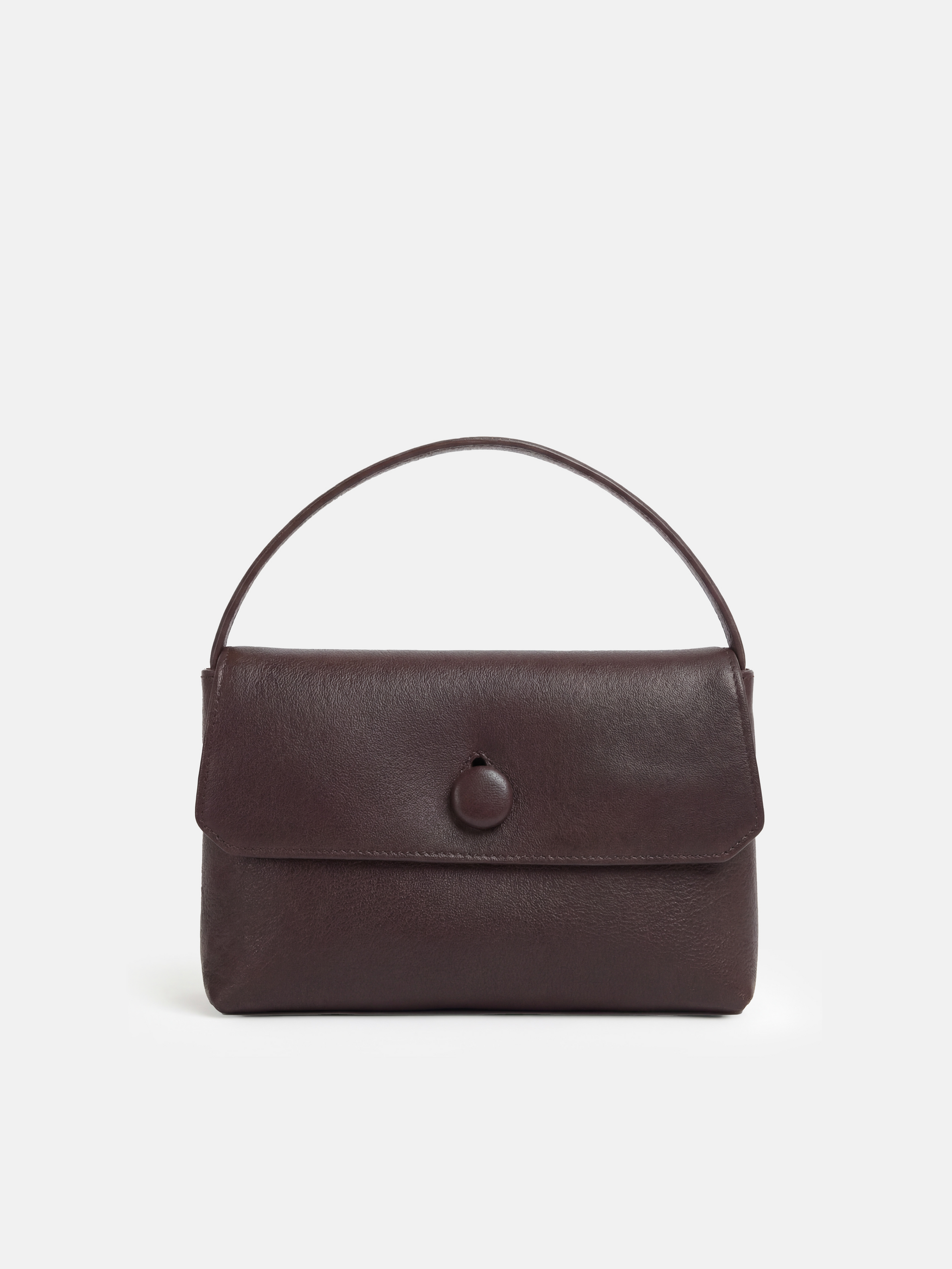 SELVANE Saddle Leather Top-Handle Flap Bag, featuring clean geometry, structured volume, and a precise flap closure.