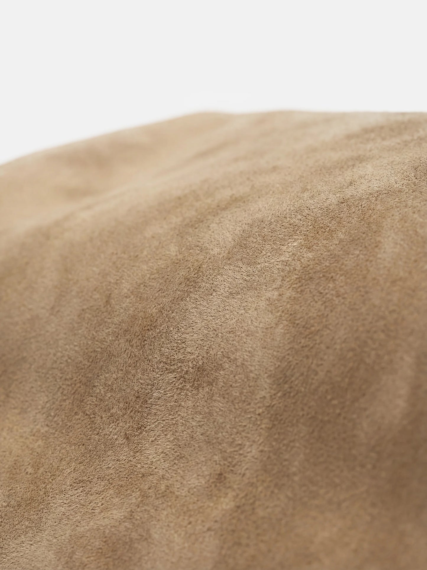 SELVANE Arched Suede Top-Handle Bag, featuring a domed silhouette and velvet-touch surface, presented on a minimalist background.