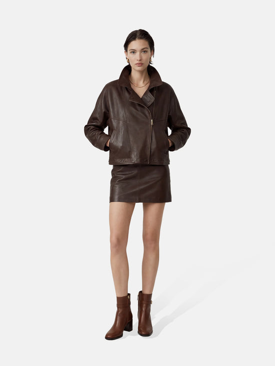 SELVANE Asymmetric Zip-Collar Lambskin Jacket in coffee-toned leather, showcasing its structural lines and urban elegance.