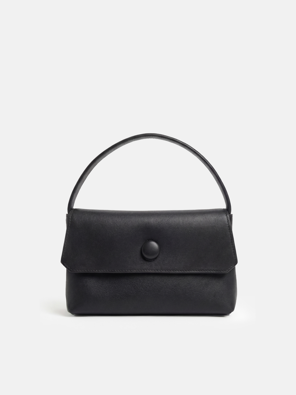 Saddle Leather Top-Handle Flap Bag — on model