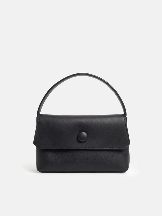 SELVANE Saddle Leather Top-Handle Flap Bag, featuring clean geometry, structured volume, and a precise flap closure.