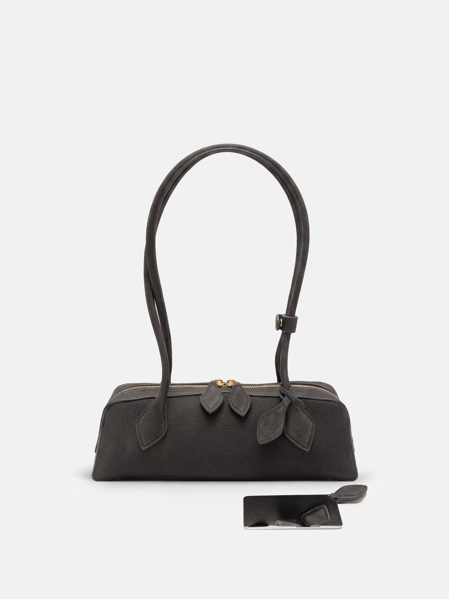 SELVANE Sausage Zipper Shoulder Bag in custom leather, longline, low-profile, softly rounded, with a streamlined zipper top.