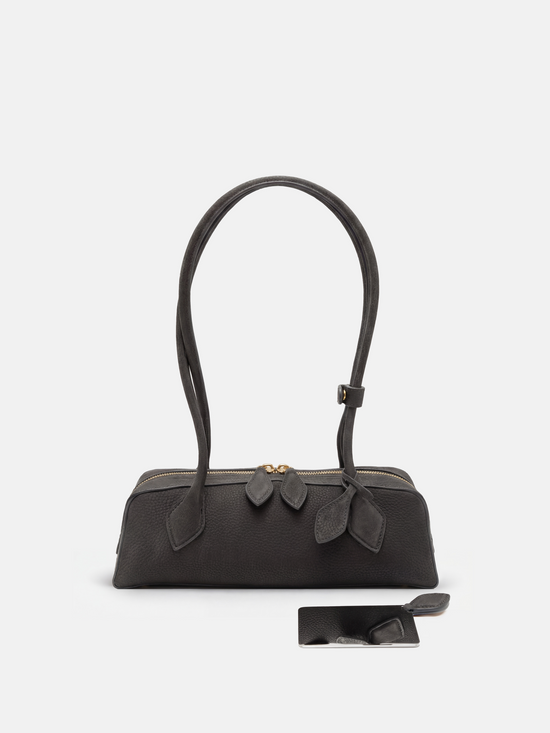 SELVANE Sausage Zipper Shoulder Bag in custom leather, longline, low-profile, softly rounded, with a streamlined zipper top.