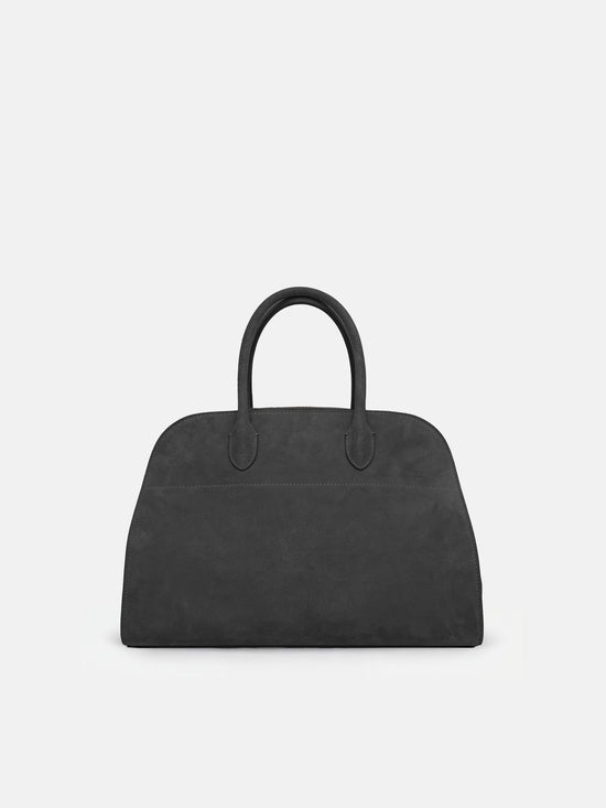 SELVANE Arched Suede Top-Handle Bag, featuring a domed silhouette and velvet-touch surface, presented on a minimalist background.